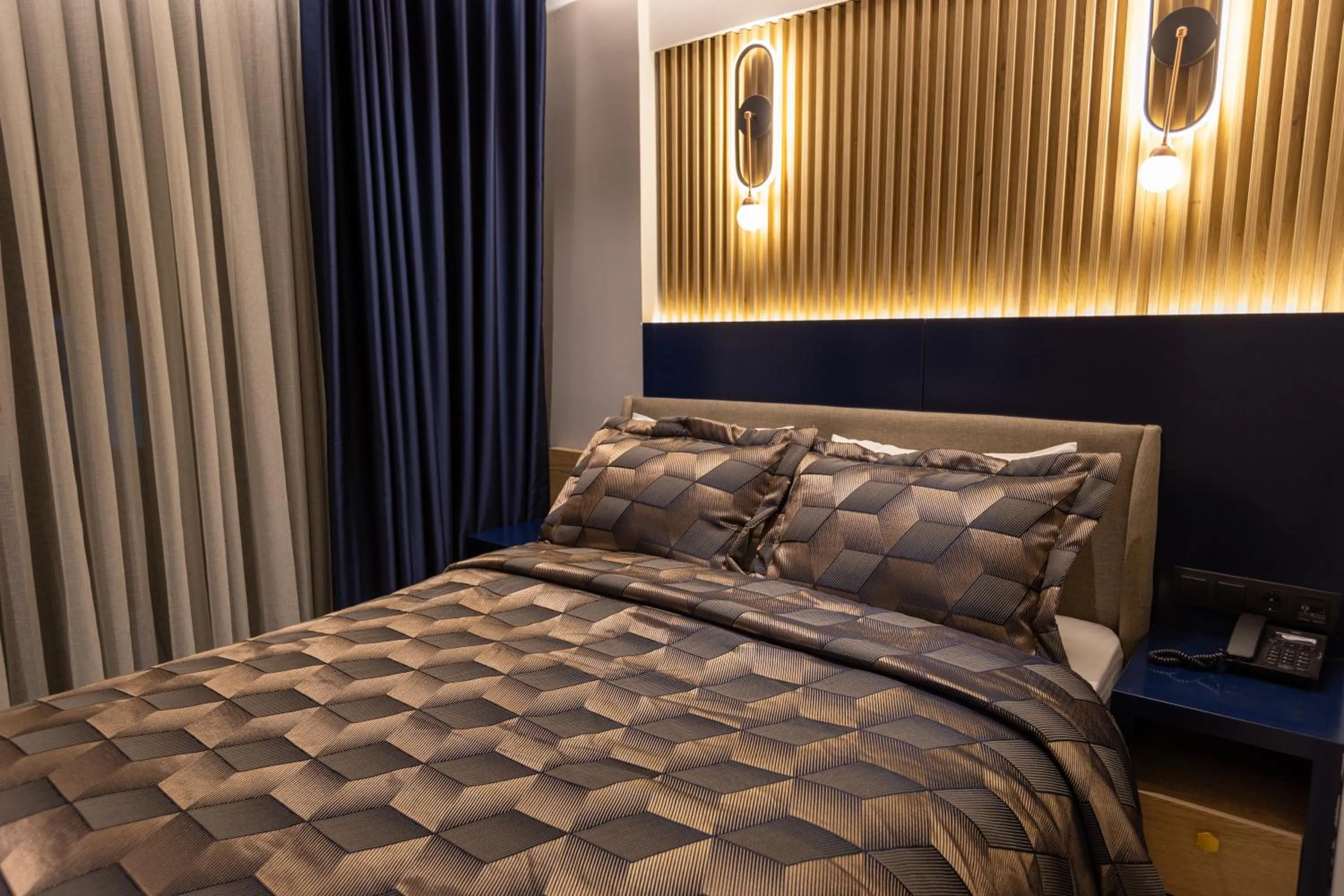 Bed in AMASRA DADAYLI HOTEL