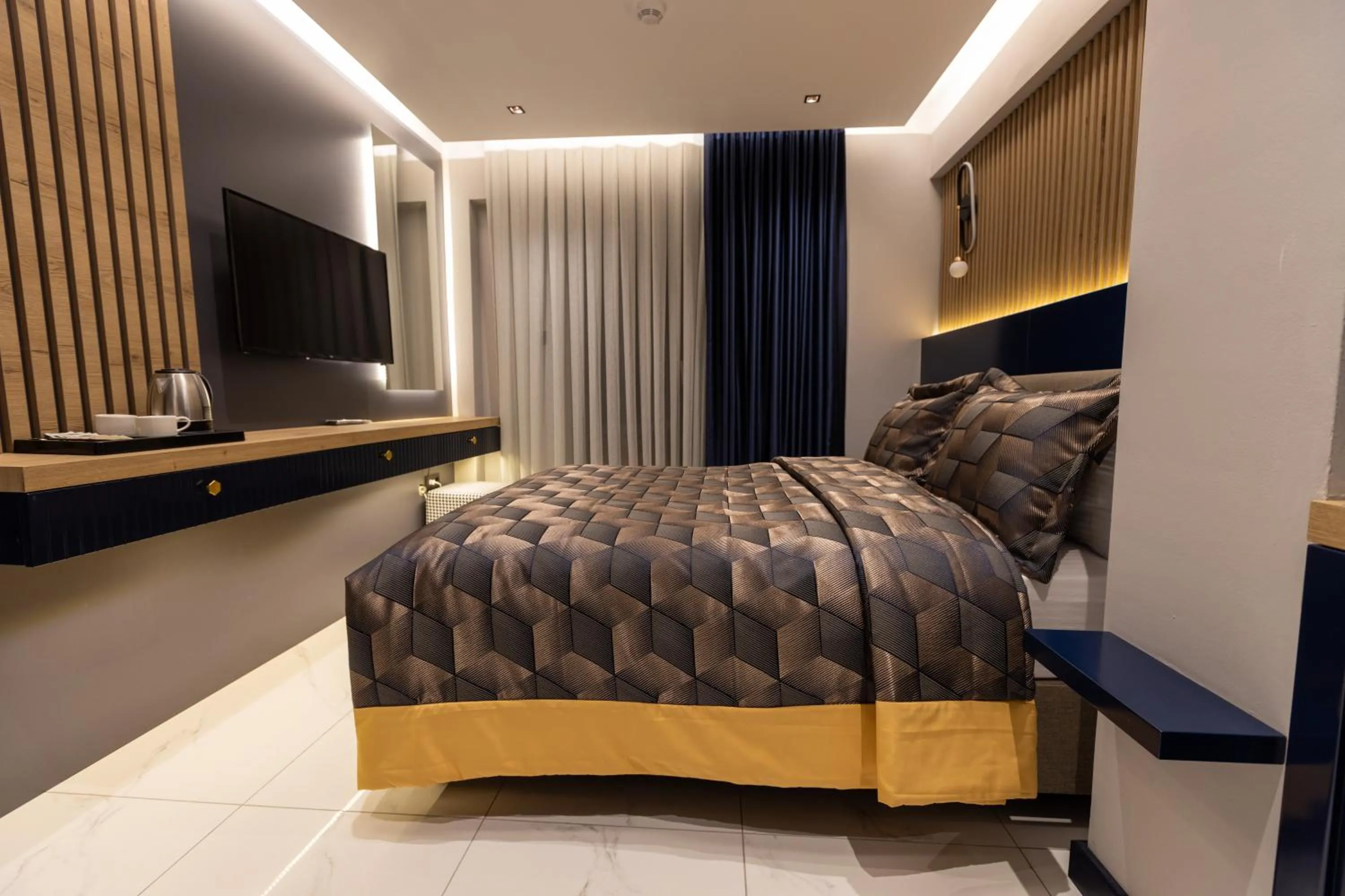 Bed in AMASRA DADAYLI HOTEL