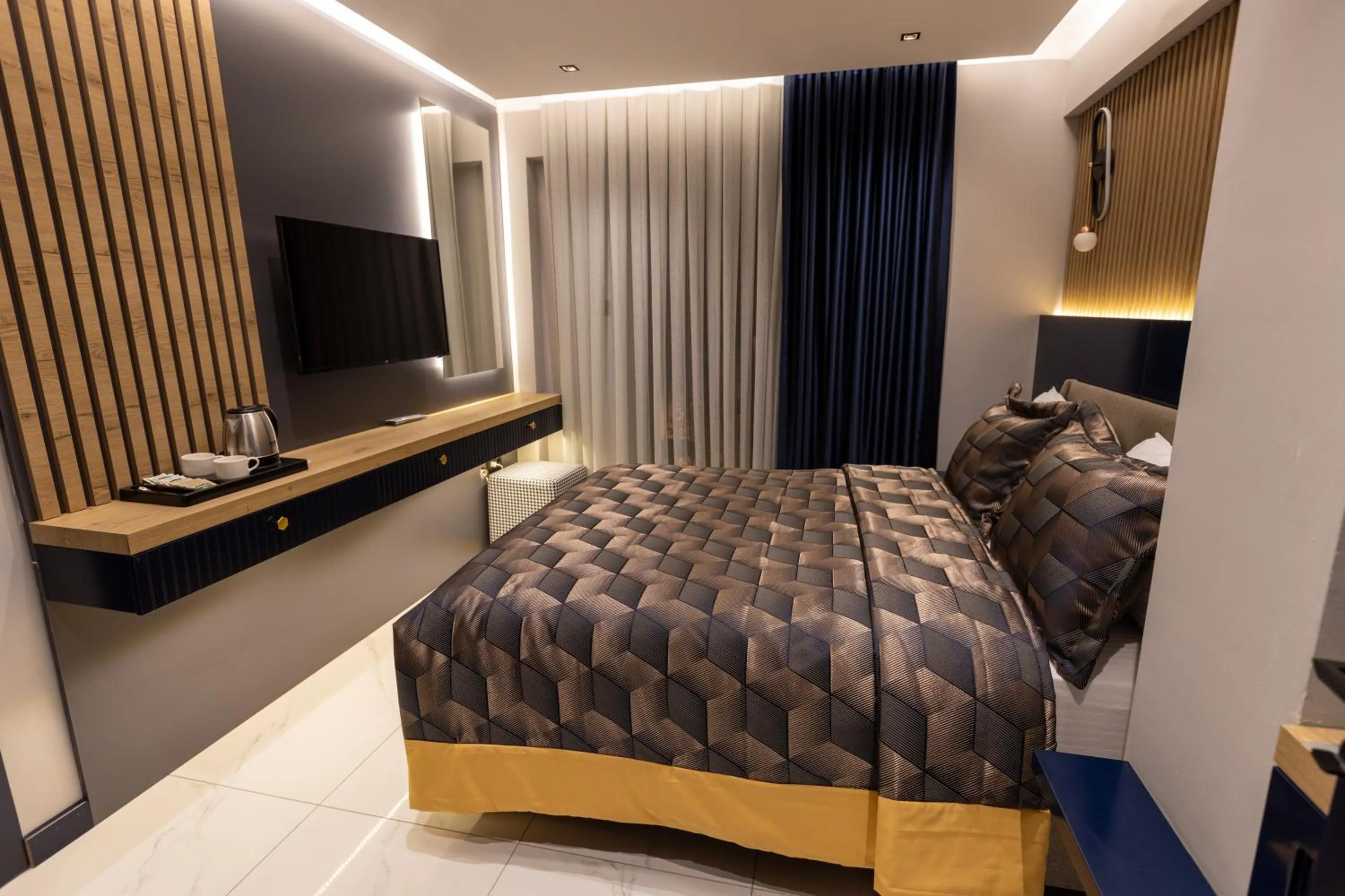 Bed in AMASRA DADAYLI HOTEL
