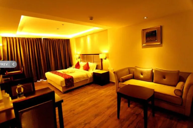 Bed in Paravoor Galaxy Hotel