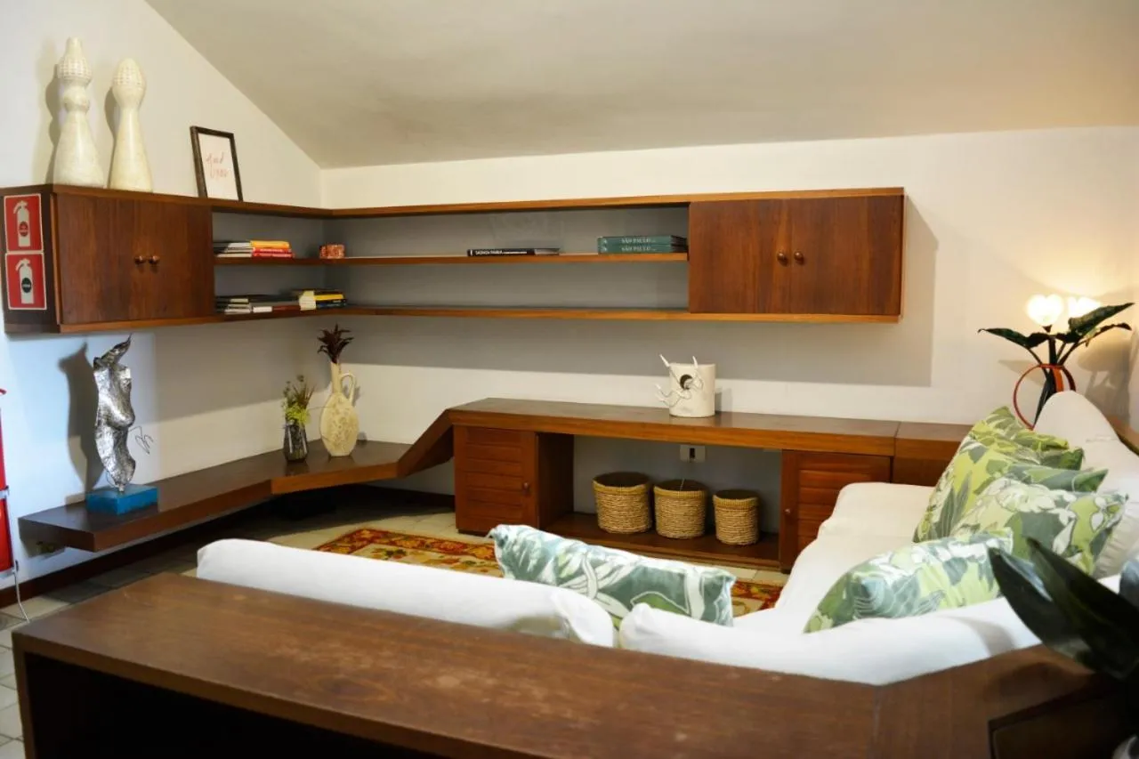 Communal lounge/ TV room in Pousada O Garimpo.