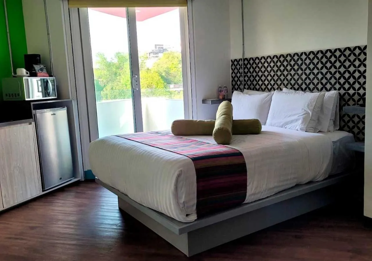 Bed in Hotel Estancias VIVE MX Cuauhtemoc, Trademark by Wyndham