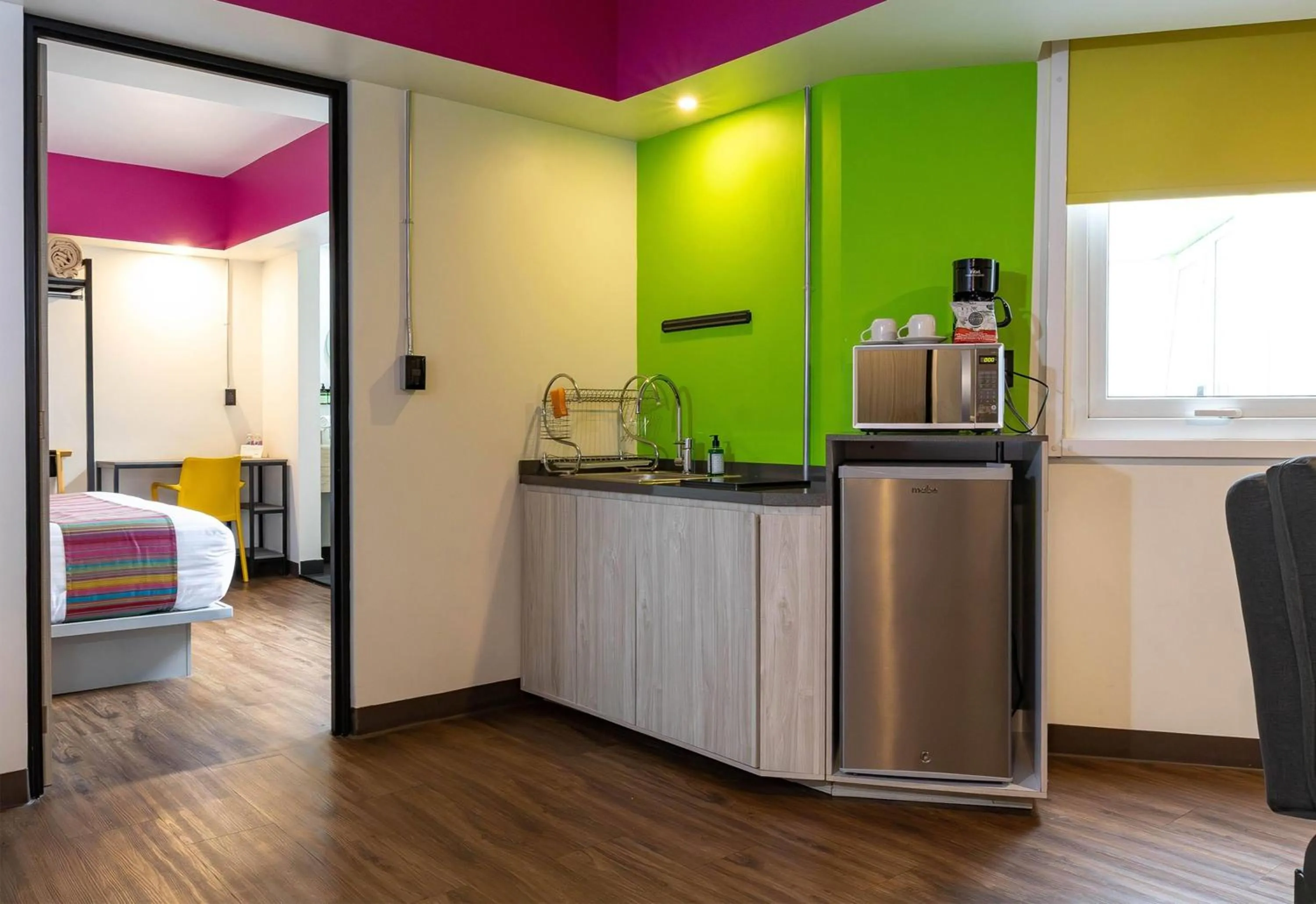 Photo of the whole room, Bed in Hotel Estancias VIVE MX Cuauhtemoc, Trademark by Wyndham