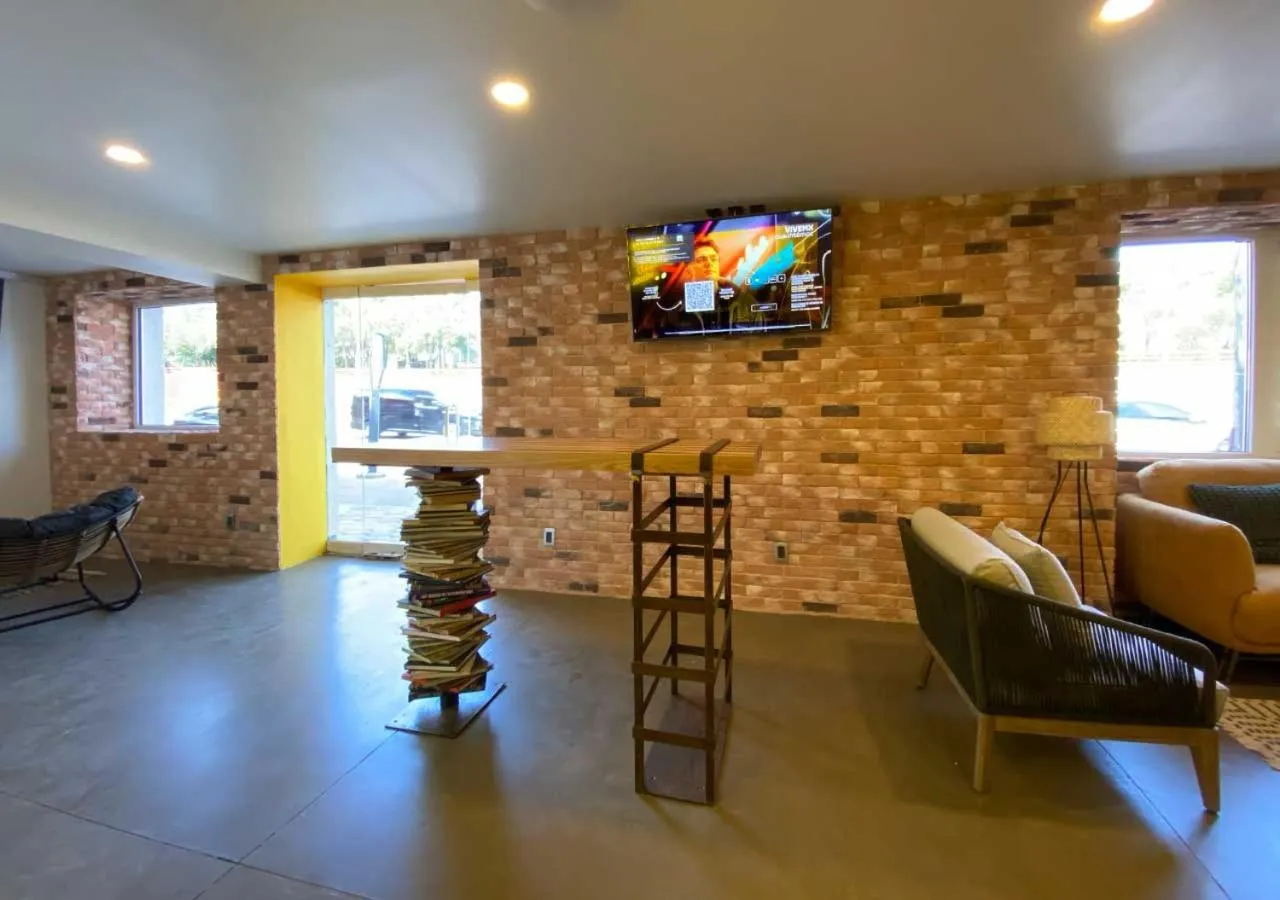 Living room in Hotel Estancias VIVE MX Cuauhtemoc, Trademark by Wyndham