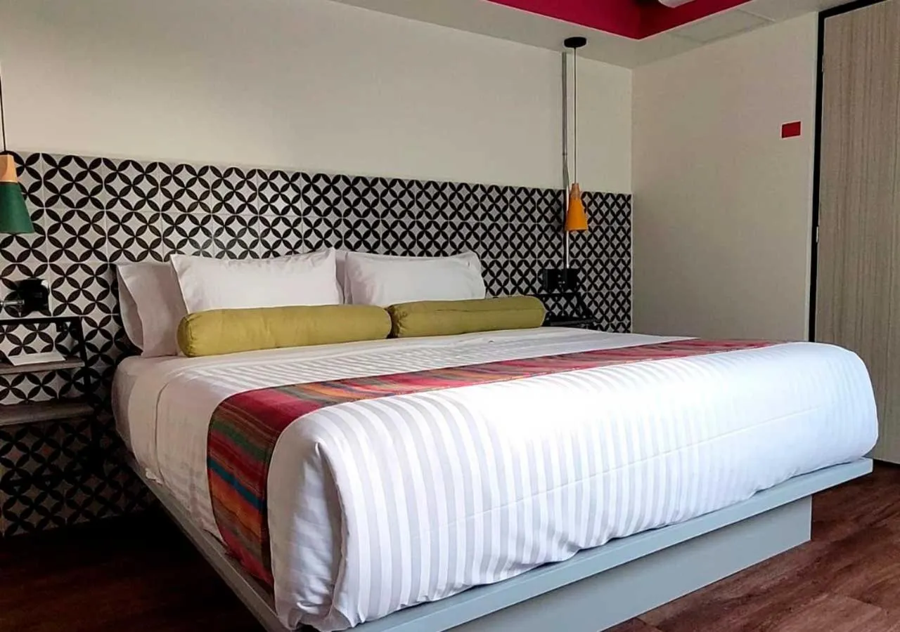 Bed in Hotel Estancias VIVE MX Cuauhtemoc, Trademark by Wyndham