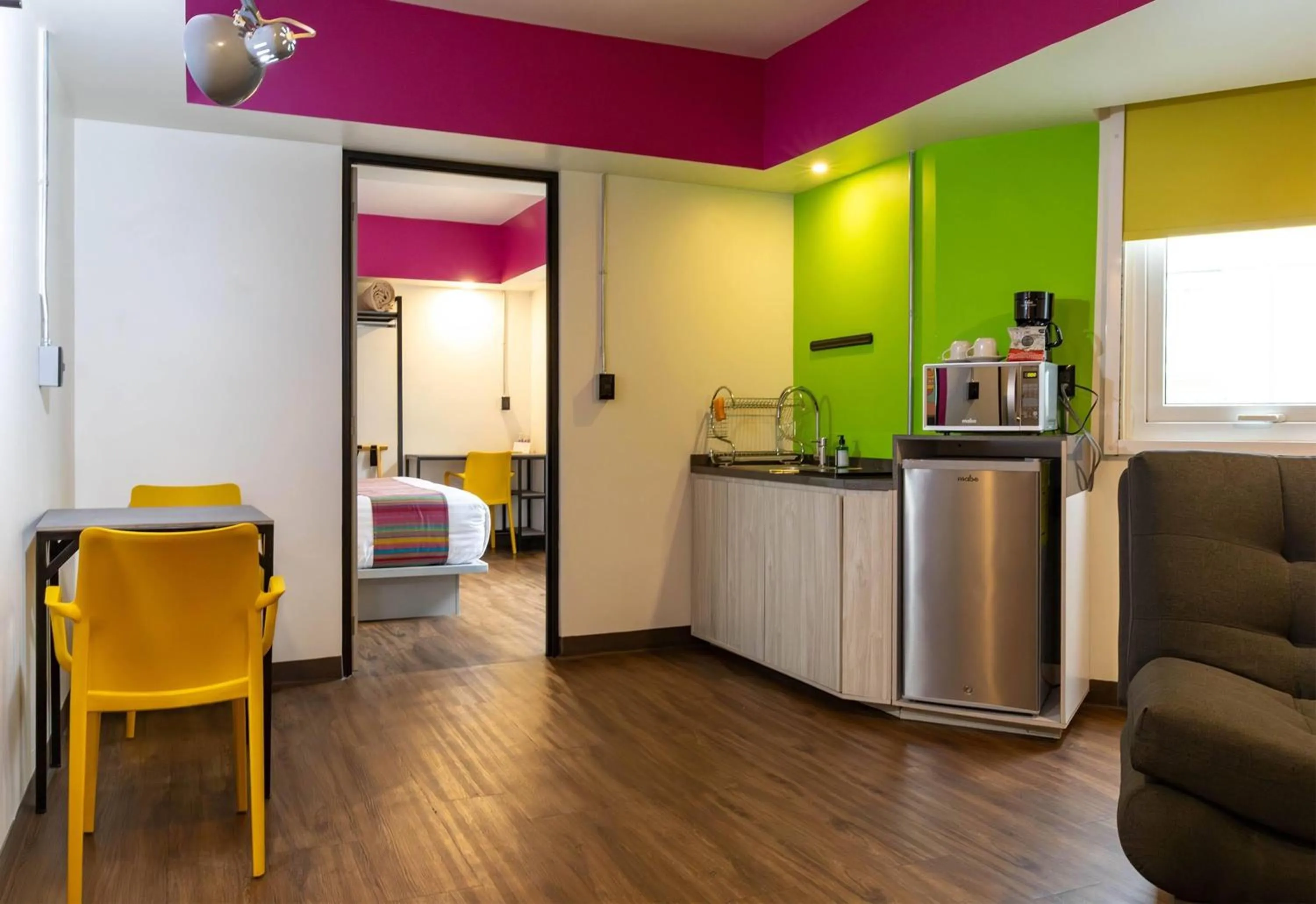 Photo of the whole room in Hotel Estancias VIVE MX Cuauhtemoc, Trademark by Wyndham