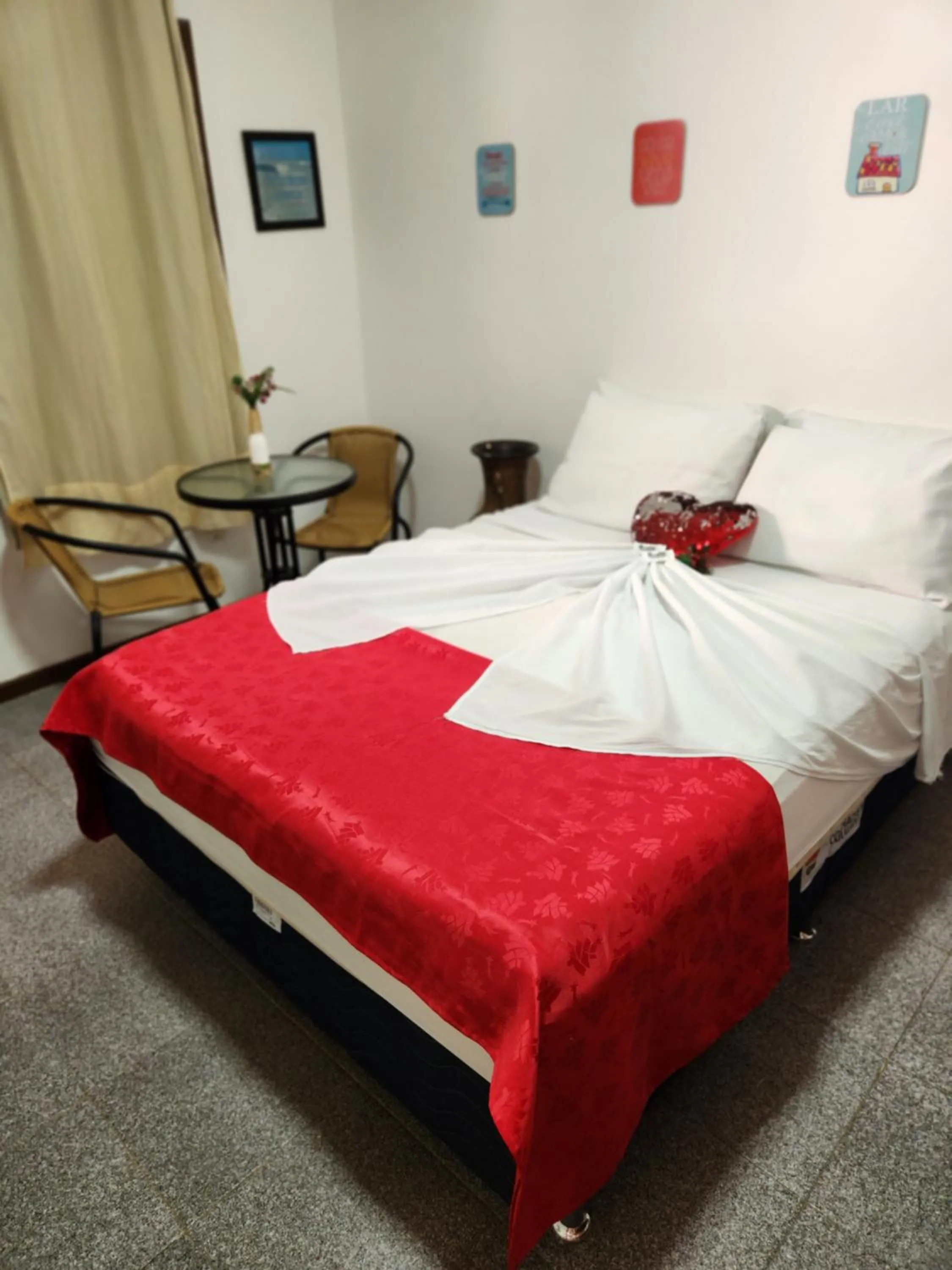 Photo of the whole room, Bed in Pousada Flor Dália