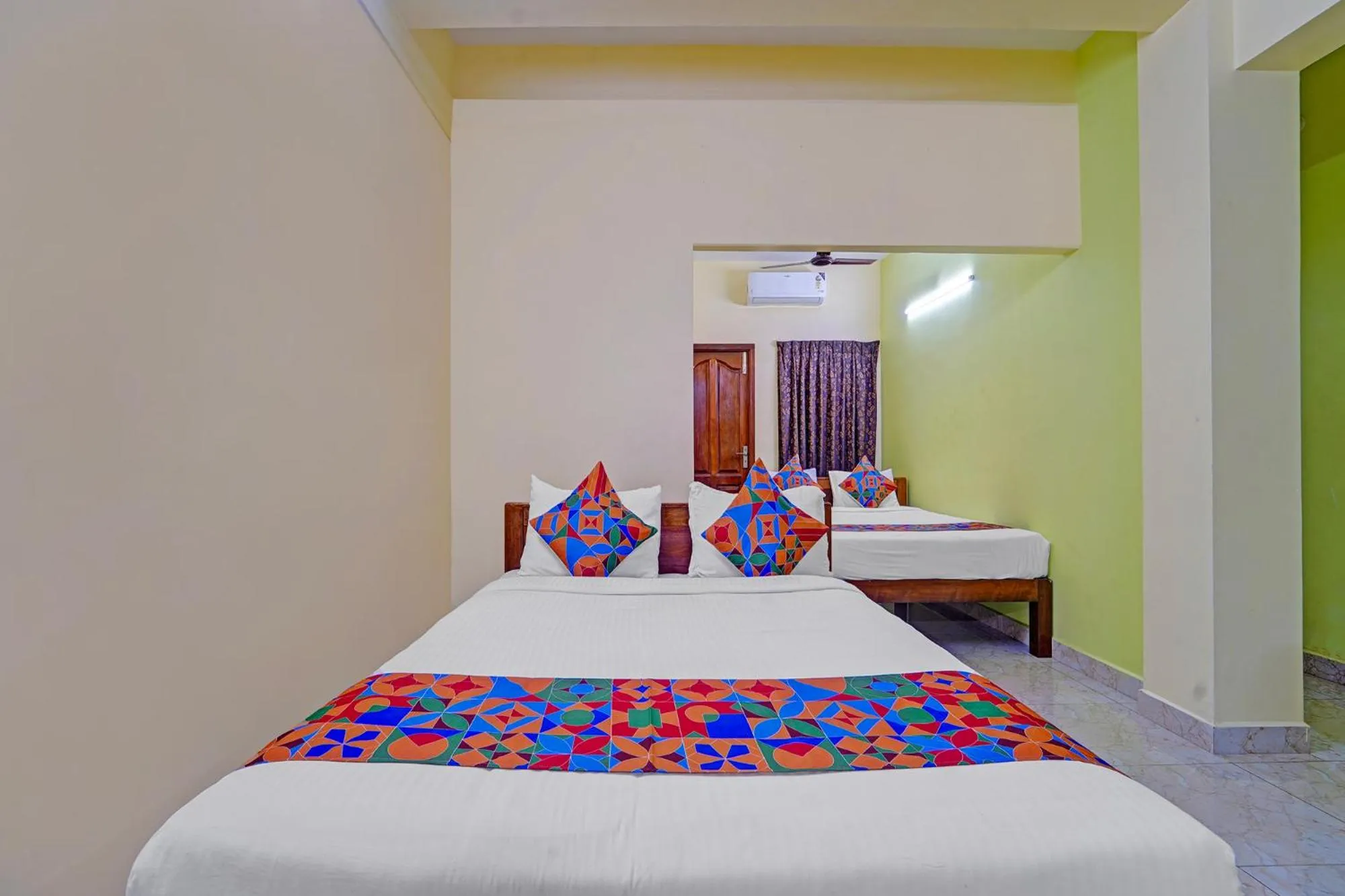 Bed in FabHotel Martine's Residency - French Colony, 5 Mins from Rock Beach