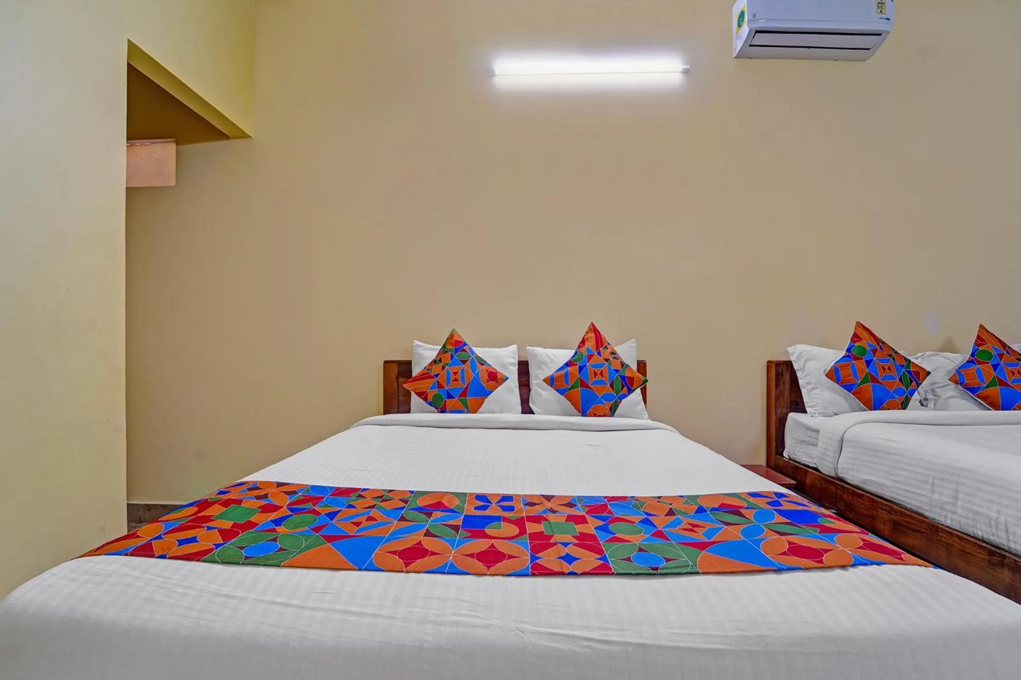 Bed in FabHotel Martine's Residency - French Colony, 5 Mins from Rock Beach