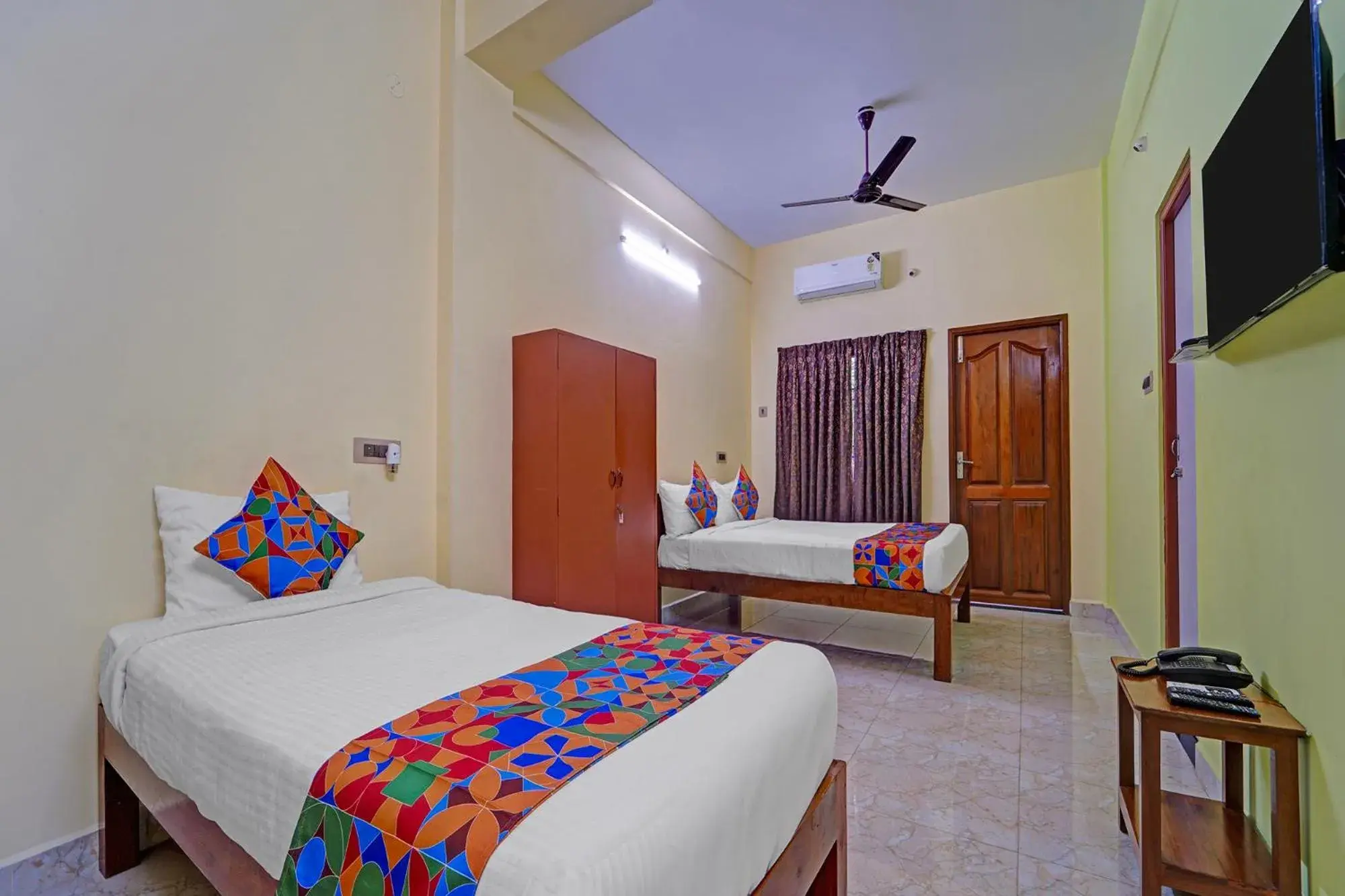 Bed in FabHotel Martine's Residency - French Colony, 5 Mins from Rock Beach Bed in FabHotel Martine's Residency - French Colony, 5 Mins from Rock Beach