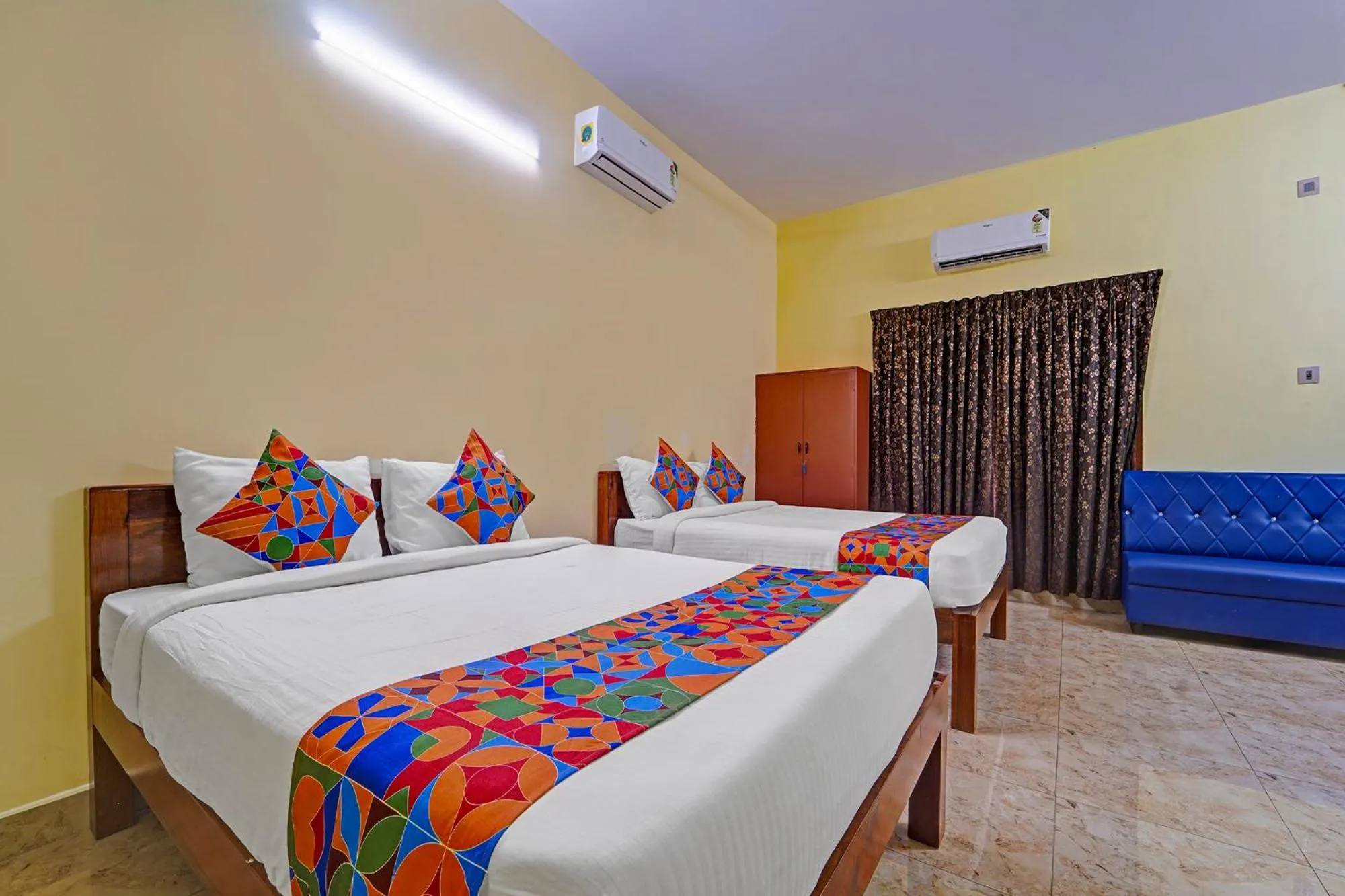 Bed in FabHotel Martine's Residency - French Colony, 5 Mins from Rock Beach