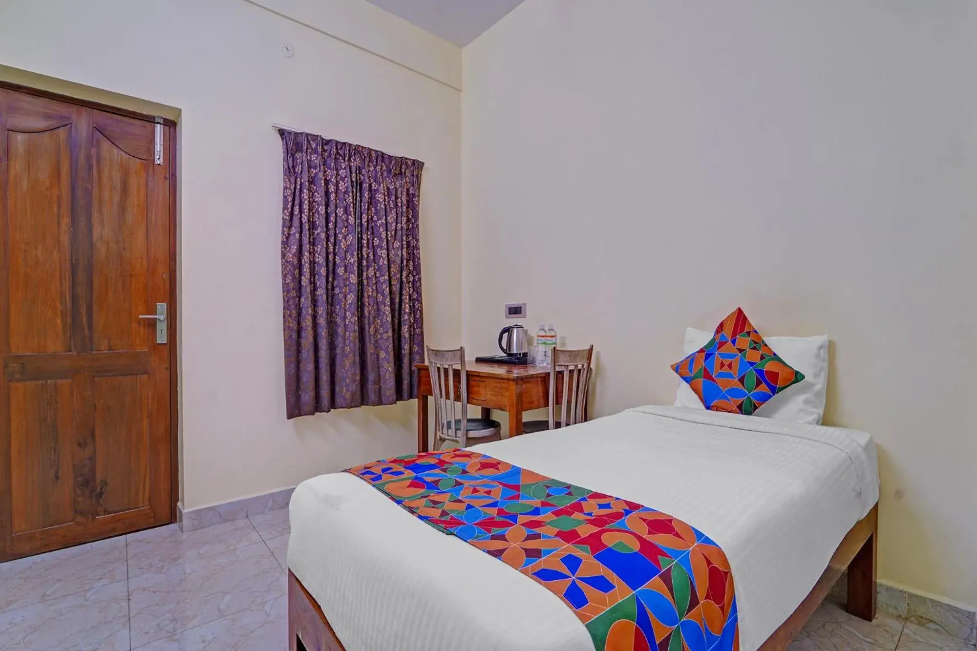 Bed in FabHotel Martine's Residency - French Colony, 5 Mins from Rock Beach Bed in FabHotel Martine's Residency - French Colony, 5 Mins from Rock Beach