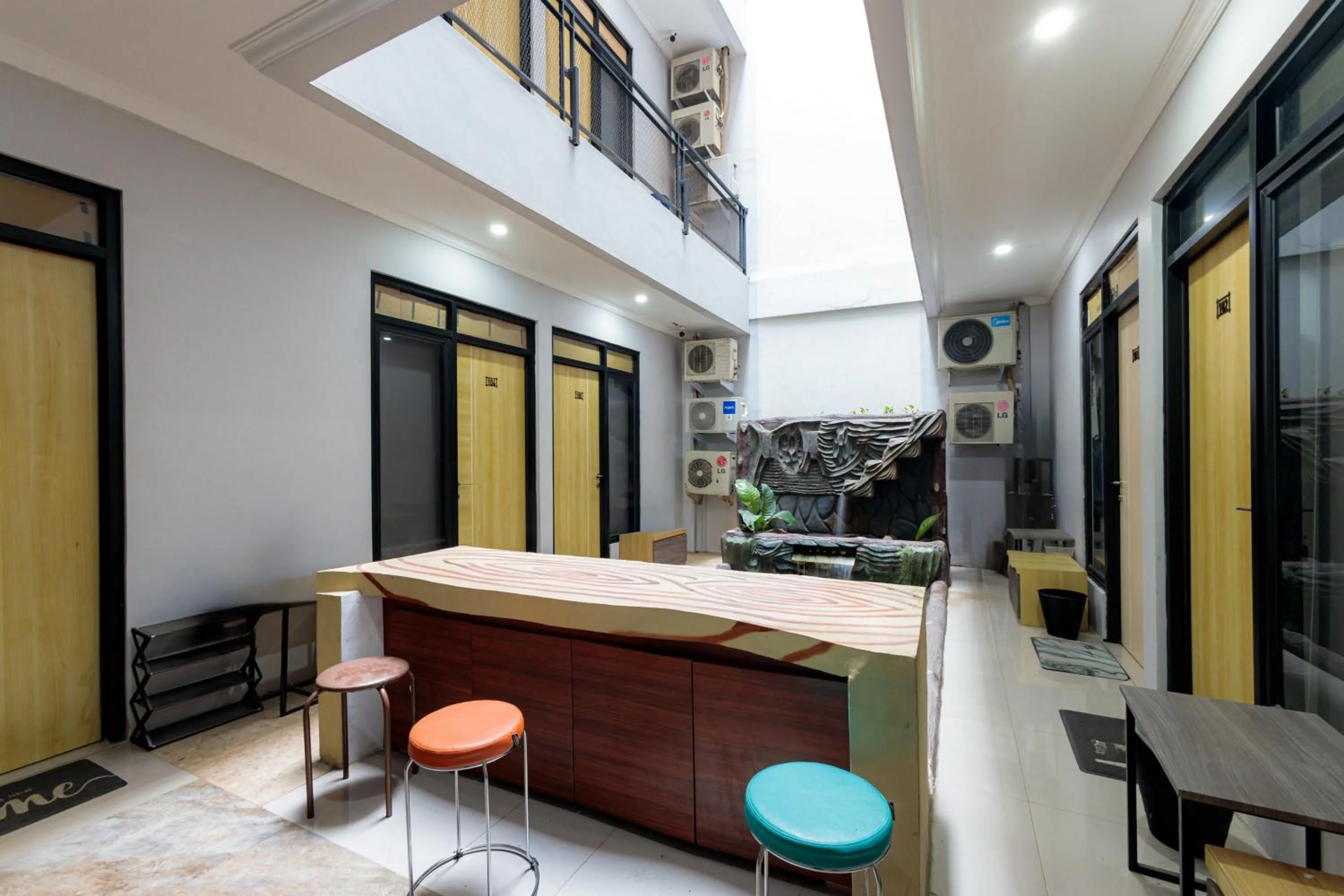 Seating area in D Twinz House Syariah Redpartner