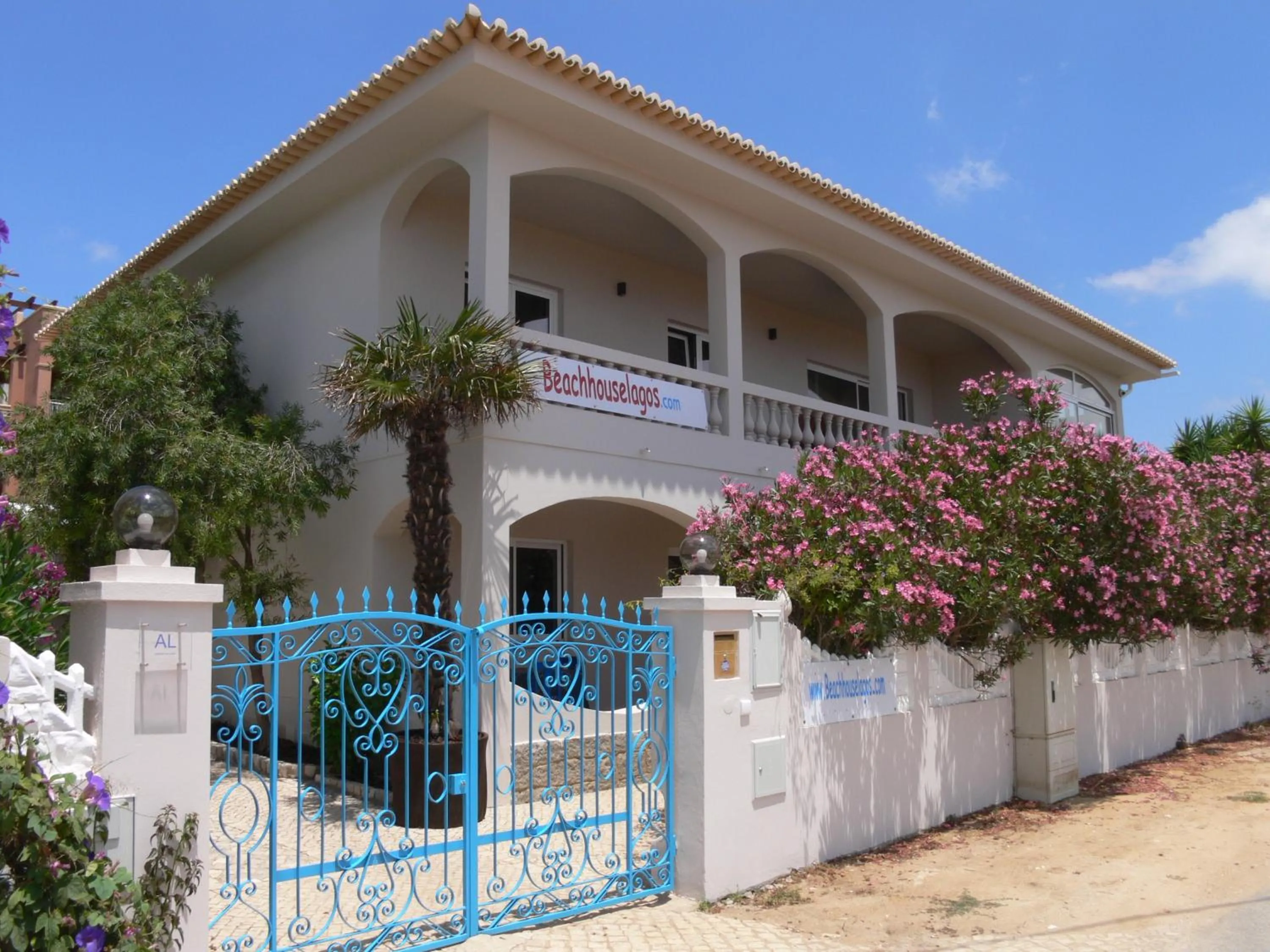 Property logo or sign in Beach House Lagos - Beachhouselagos - Meia Praia