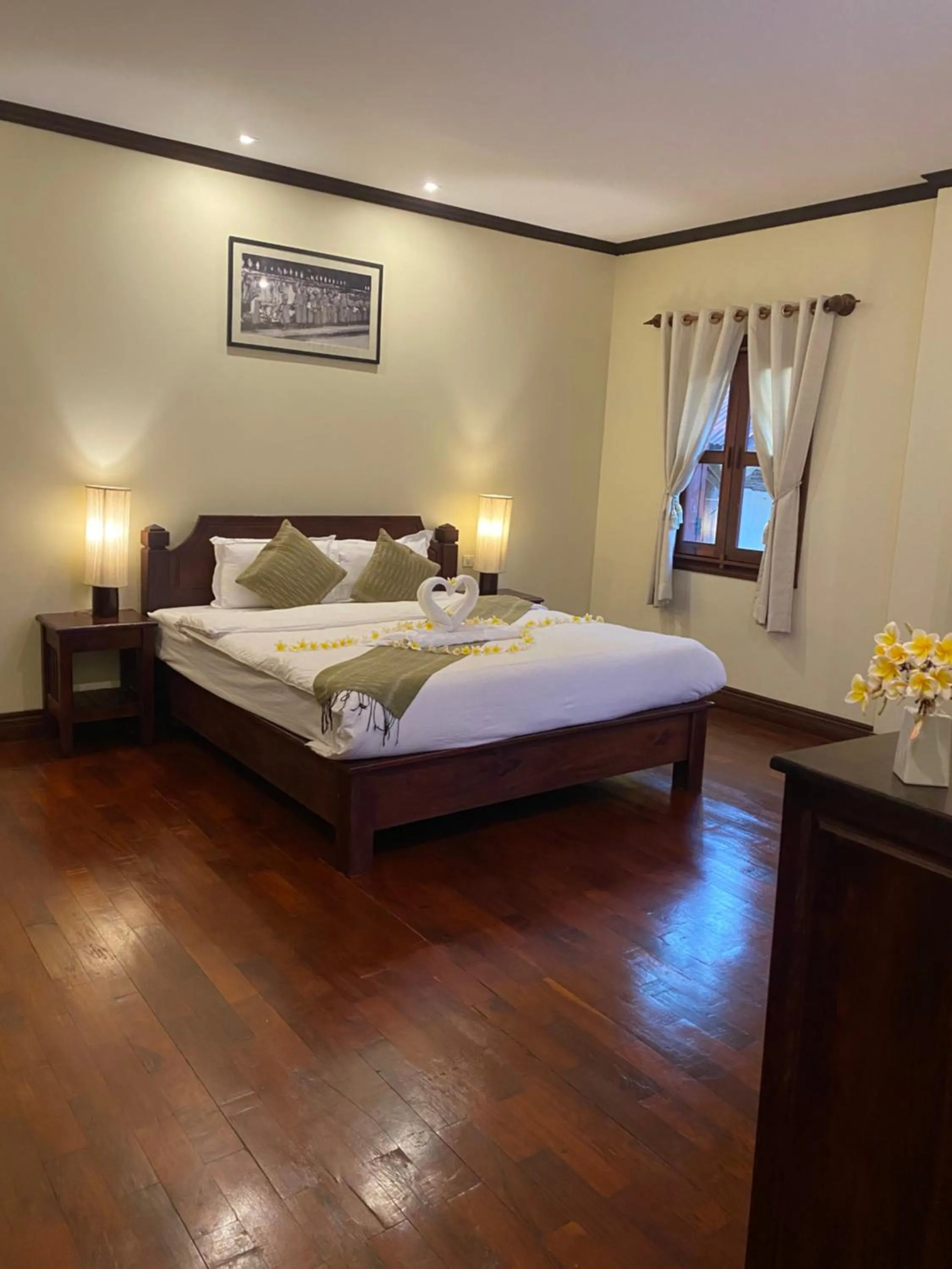 Bed in Luang Prabang Residence & Travel