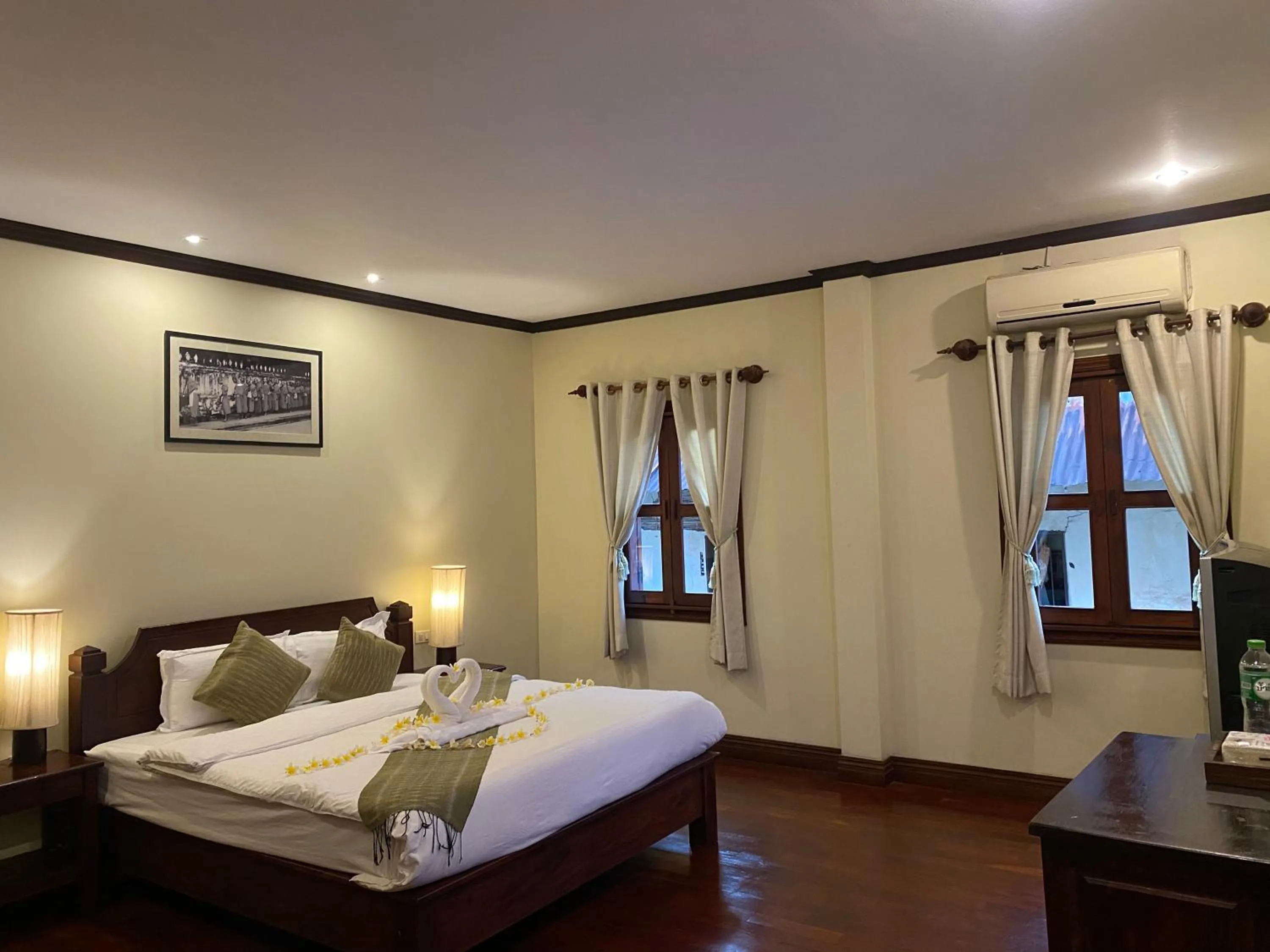 Photo of the whole room, Bed in Luang Prabang Residence & Travel
