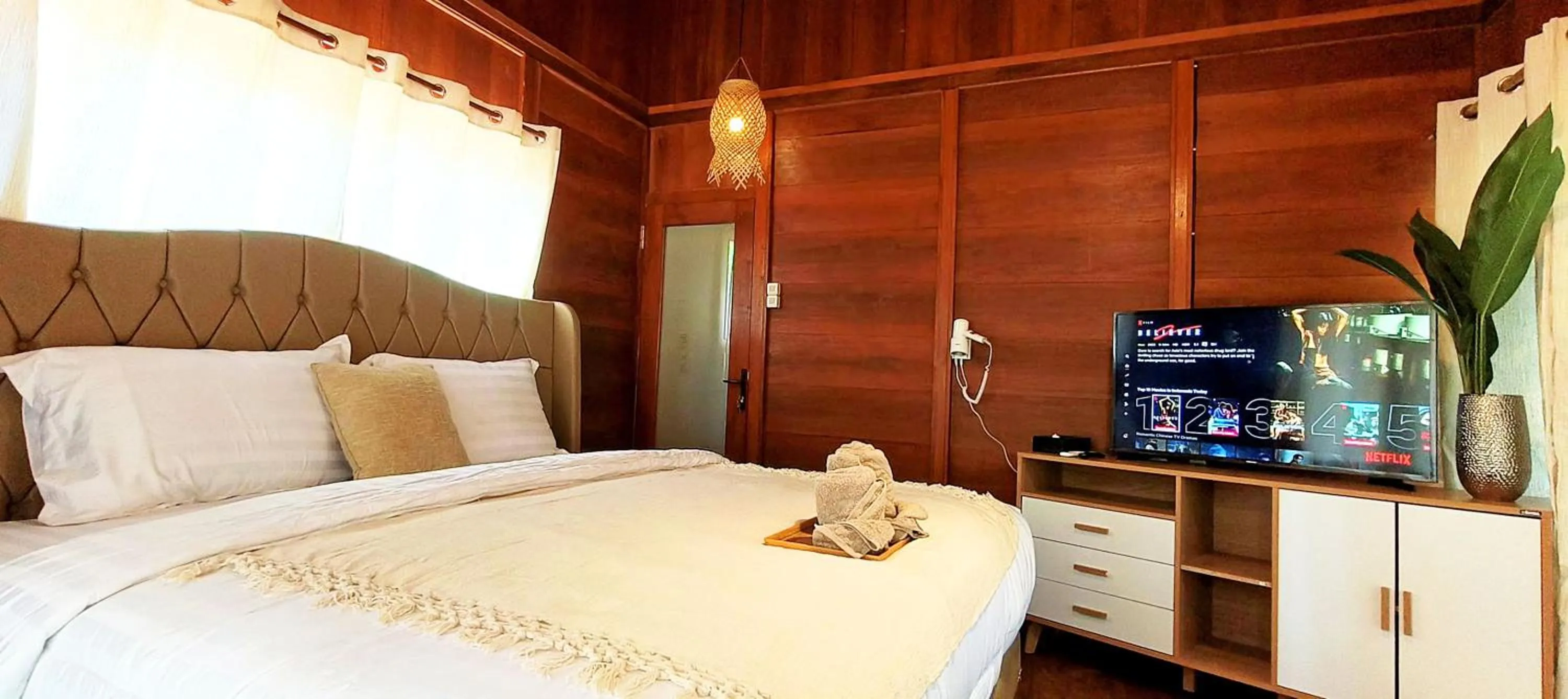 Bed in Uma Villa Manado