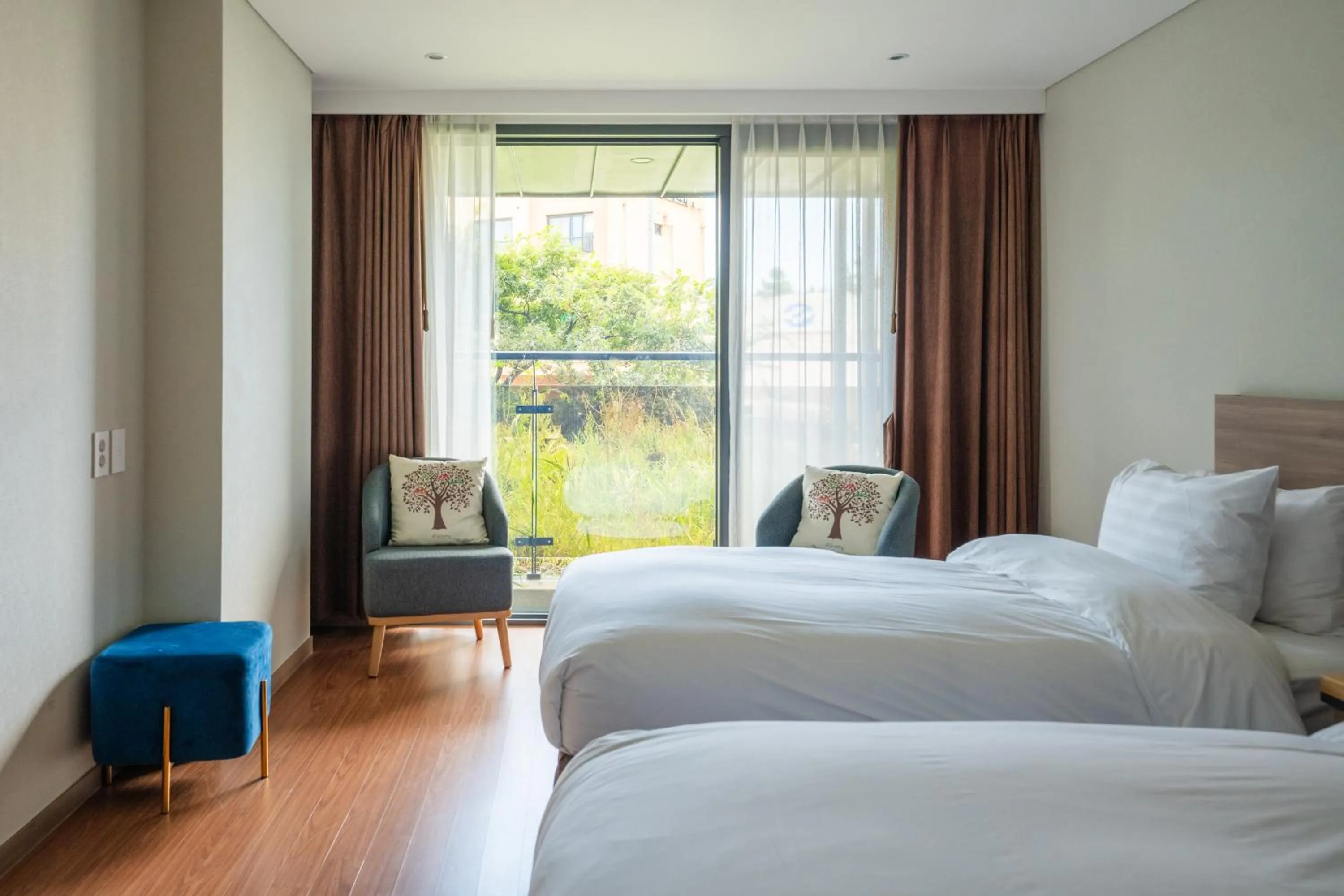 Bed in Hotel Fine Jeju