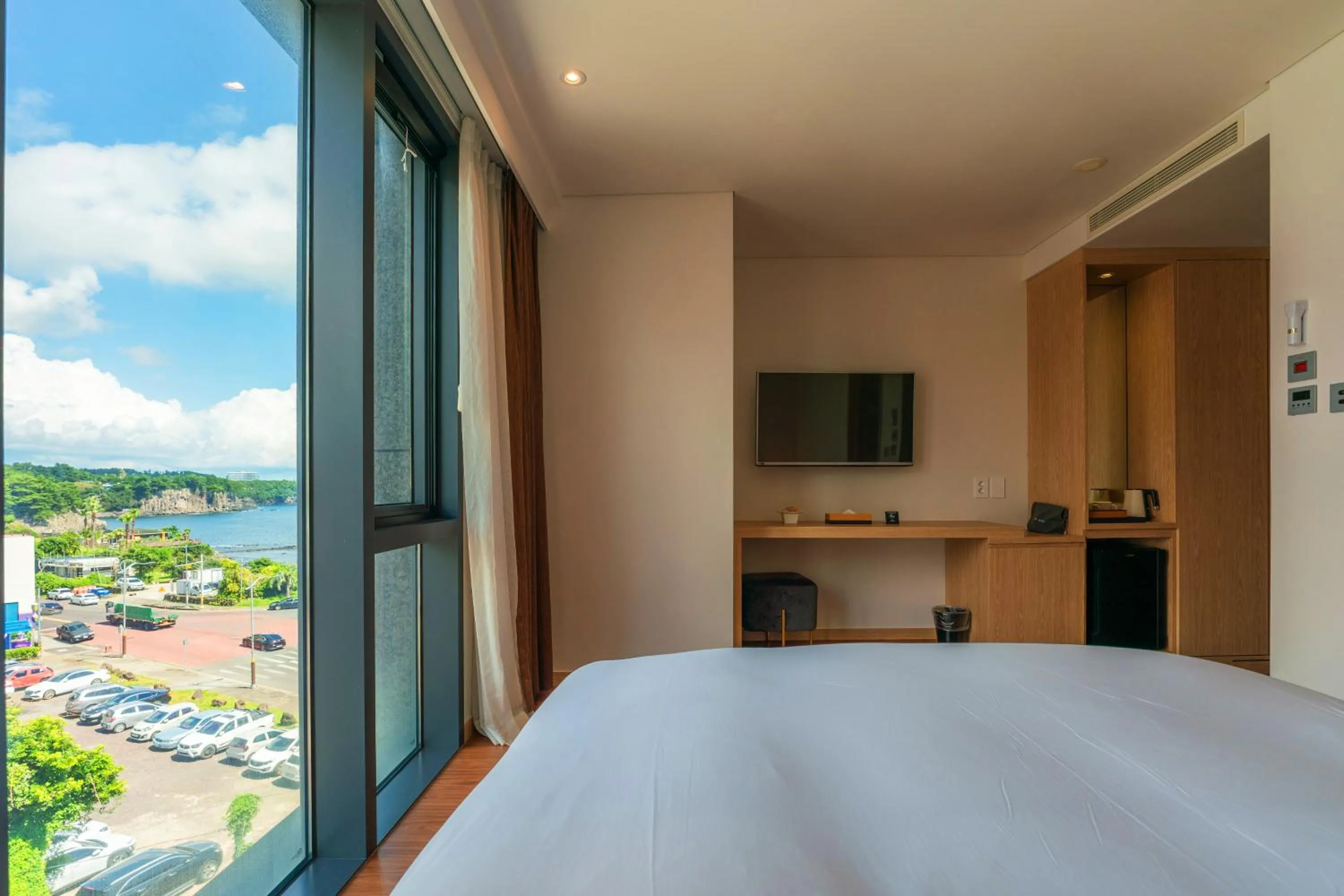 View (from property/room), Bed in Hotel Fine Jeju