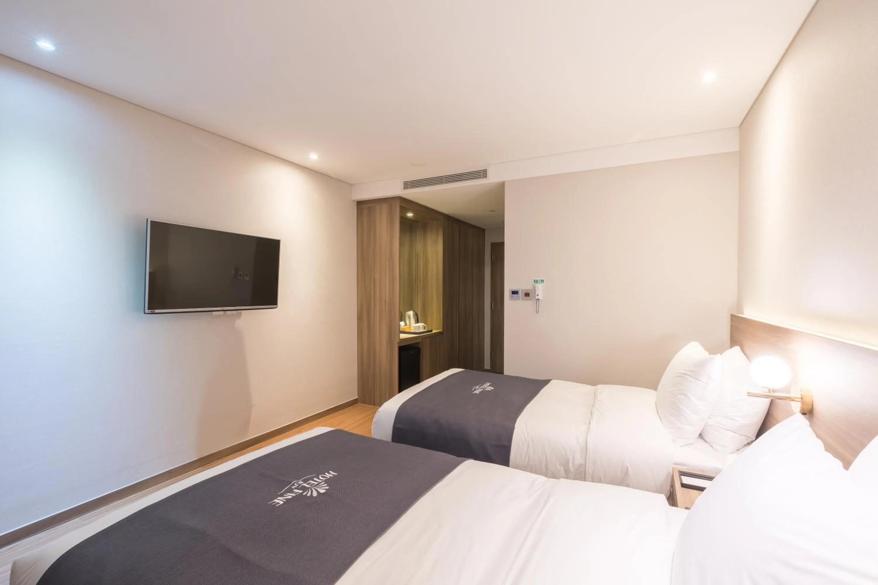 Bed in Hotel Fine Jeju