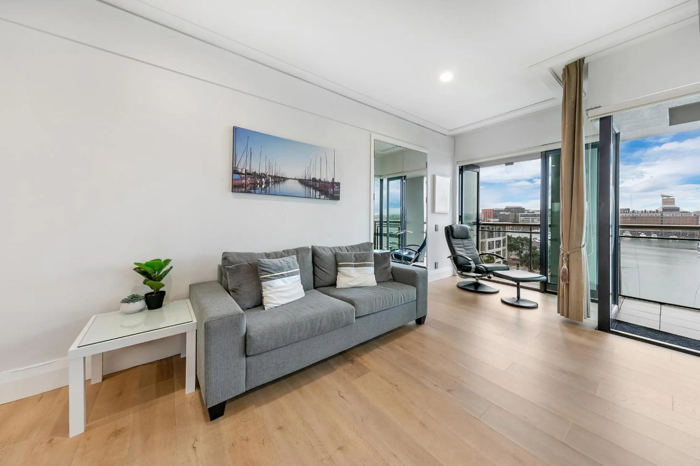Living room in Exquisite Sun Soaked Corner Apartment