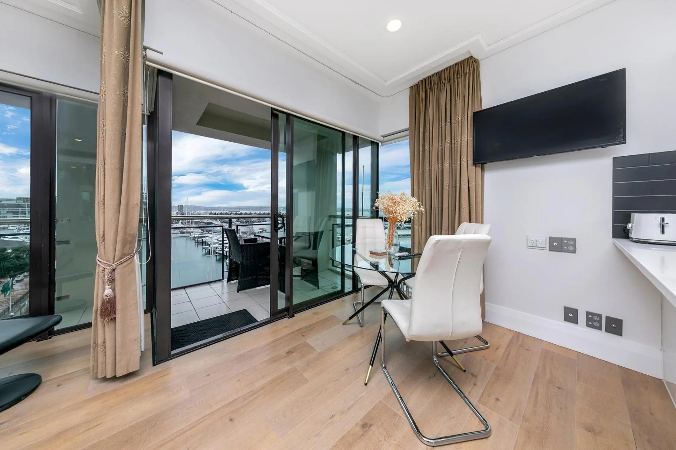 Dining area in Exquisite Sun Soaked Corner Apartment