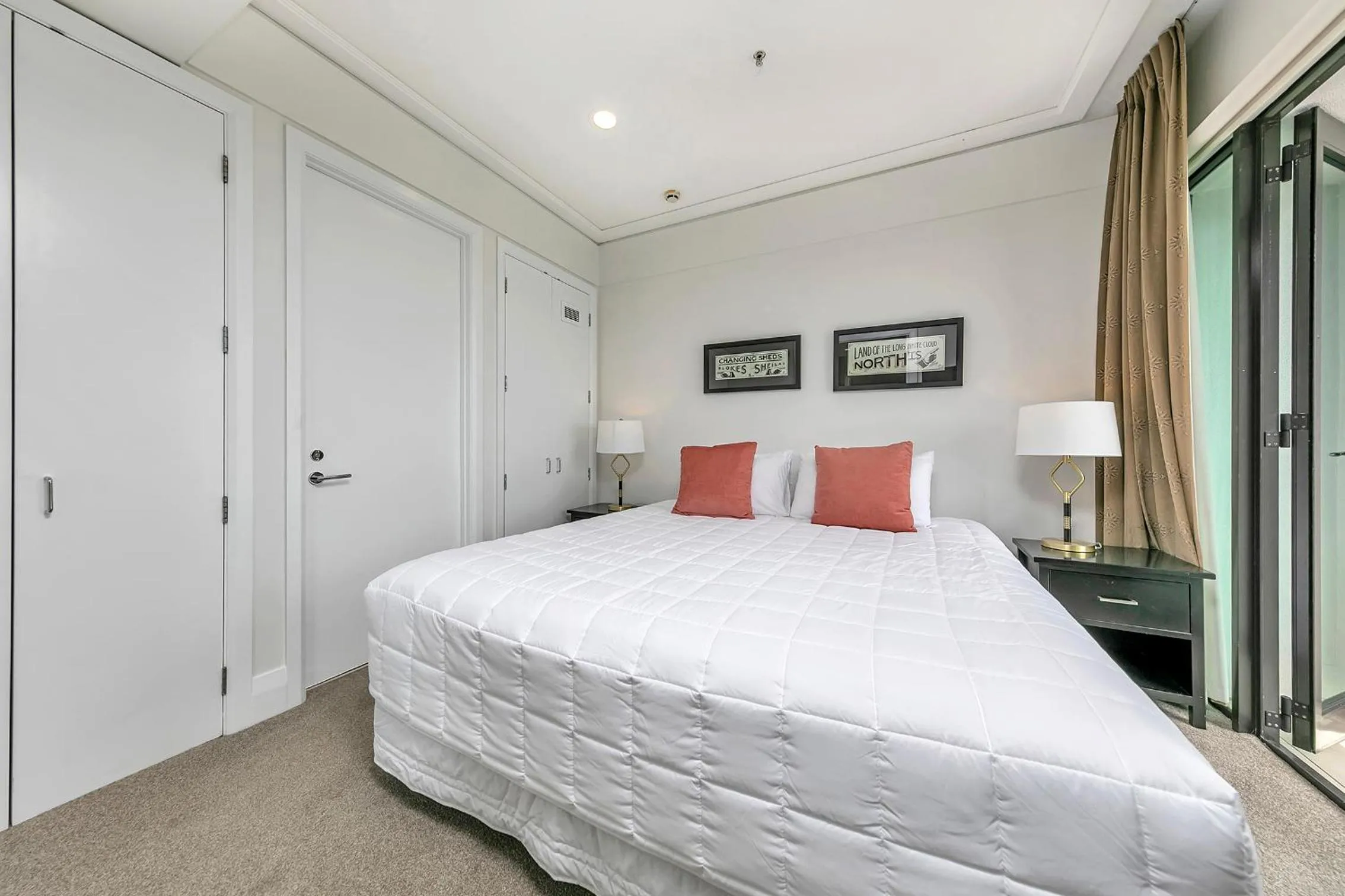 Bed in Exquisite Sun Soaked Corner Apartment