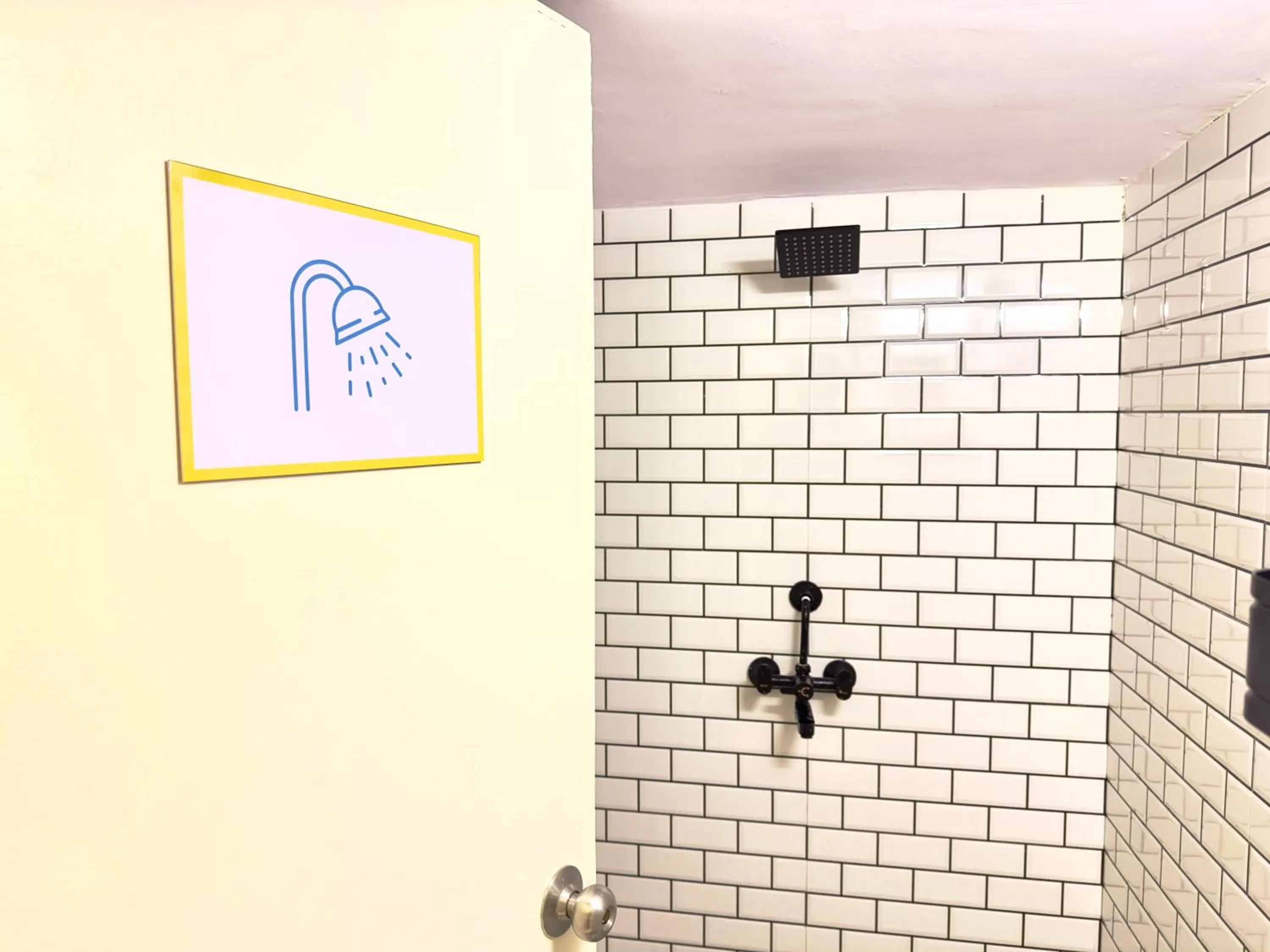 Shower in Locomo Hostel Express - Stay Work Eat