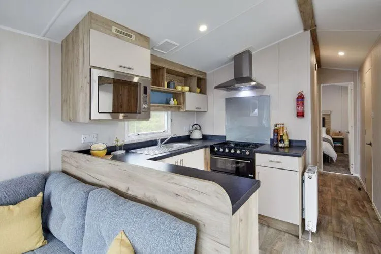 Kitchen or kitchenette in Killigarth Manor Holiday Park