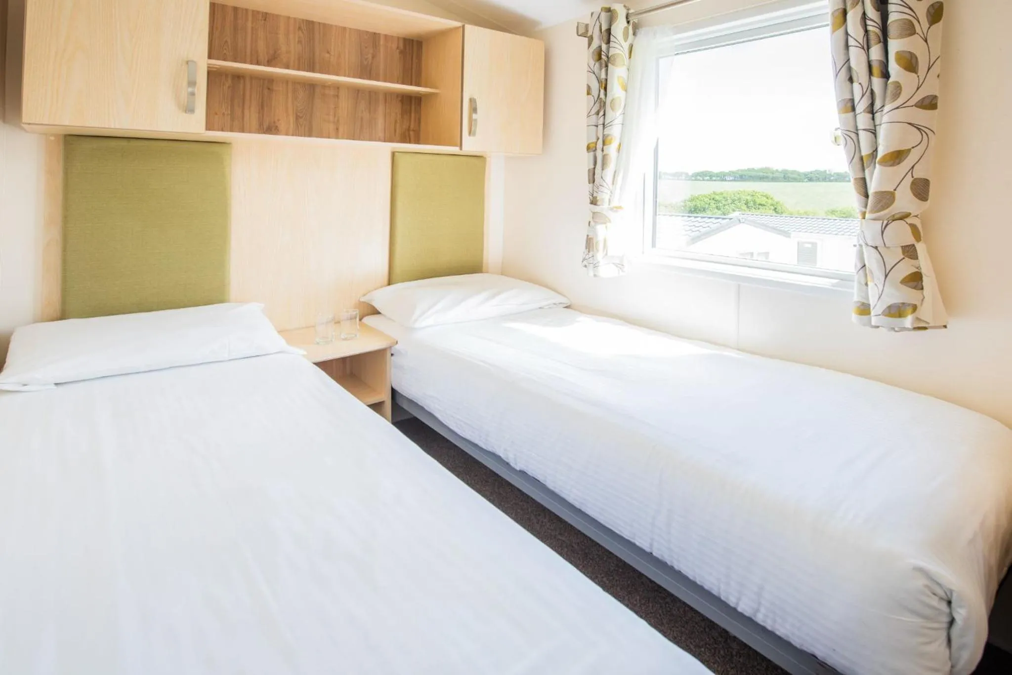 Bed in Killigarth Manor Holiday Park