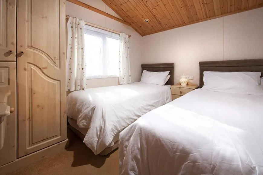 Bed in Killigarth Manor Holiday Park