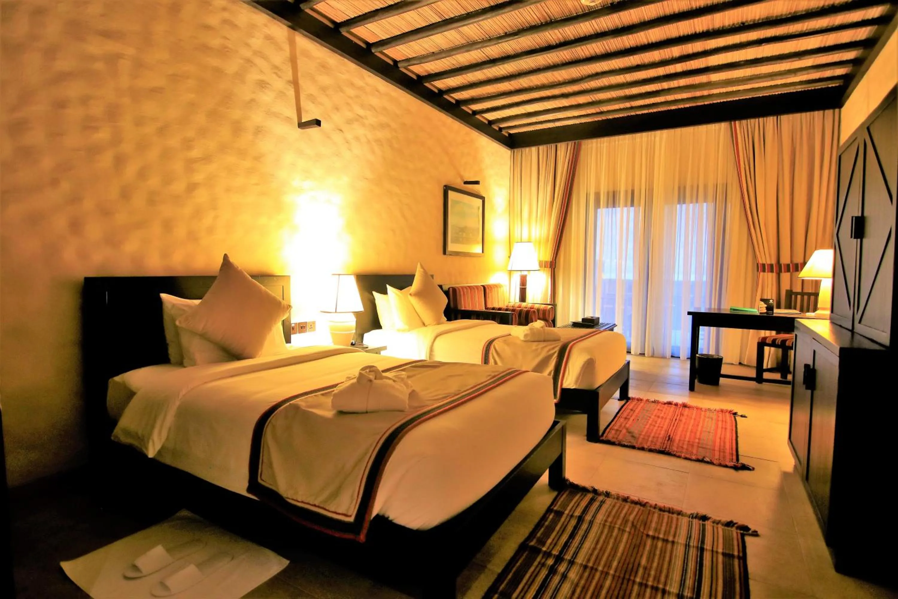 Bed in Atana Musandam Resort