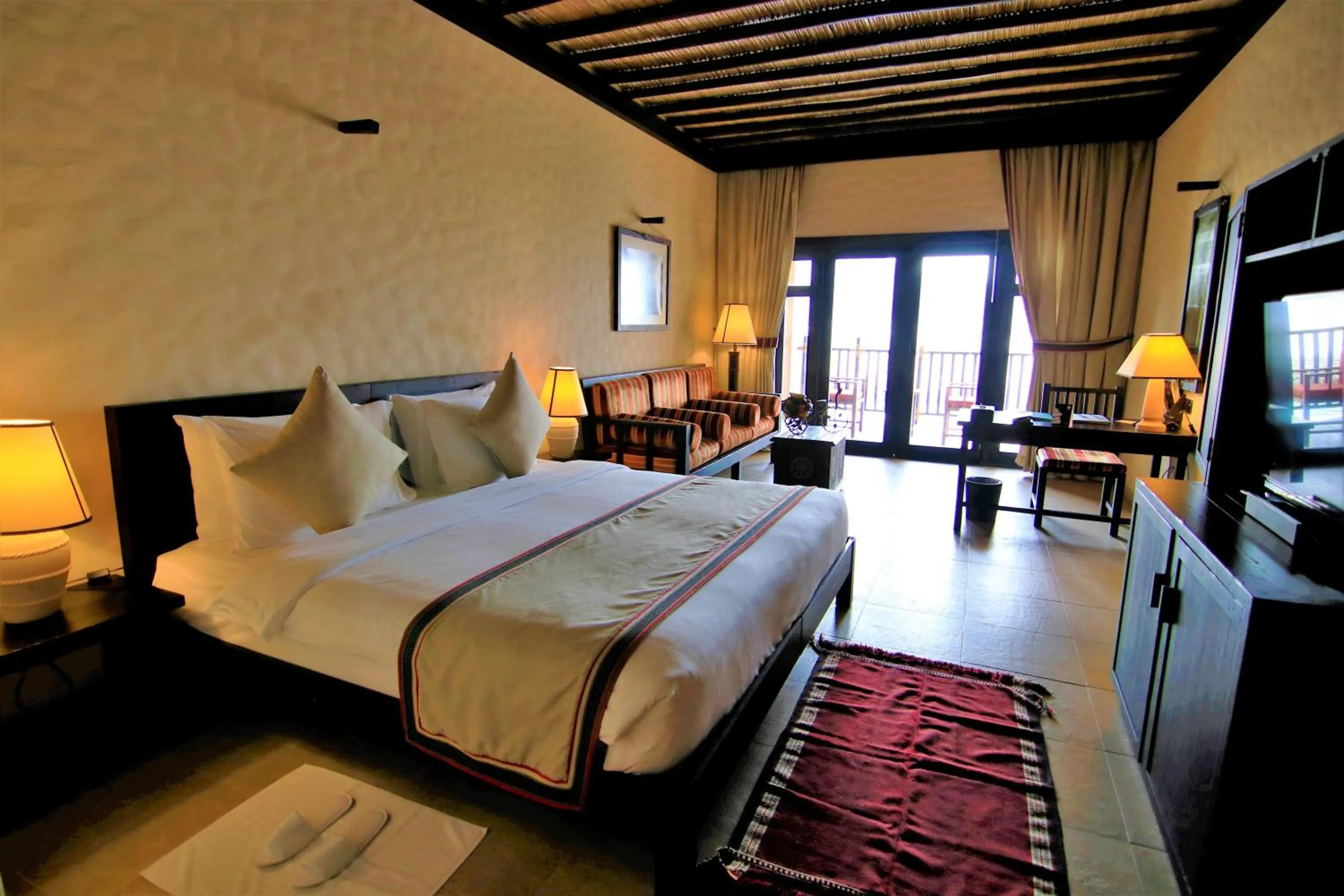 Photo of the whole room, Bed in Atana Musandam Resort