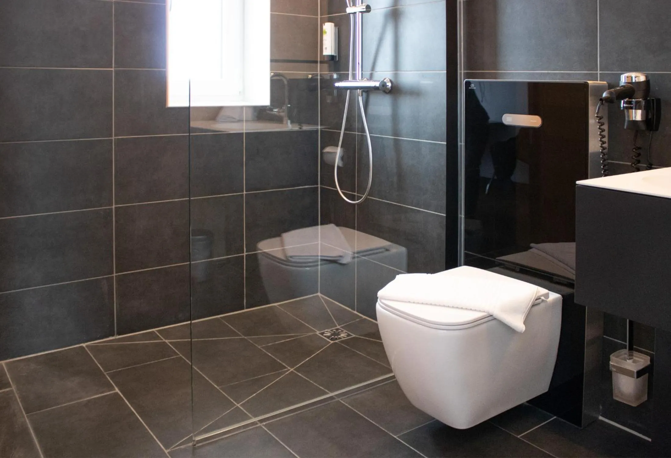 Shower in LGO Hotel by WMM Hotels