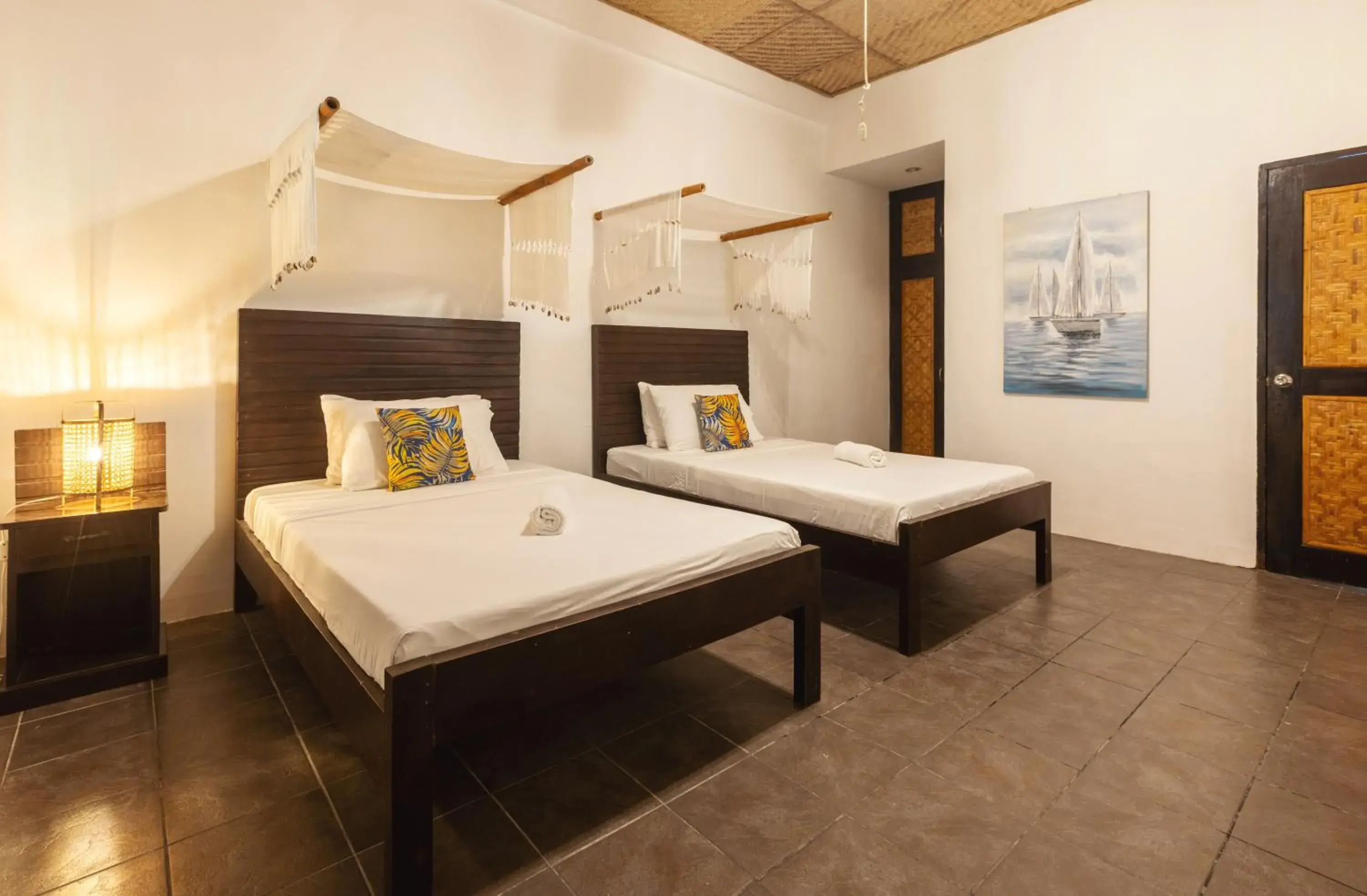 Bed in Nabulao Beach Resort Bed in Nabulao Beach Resort