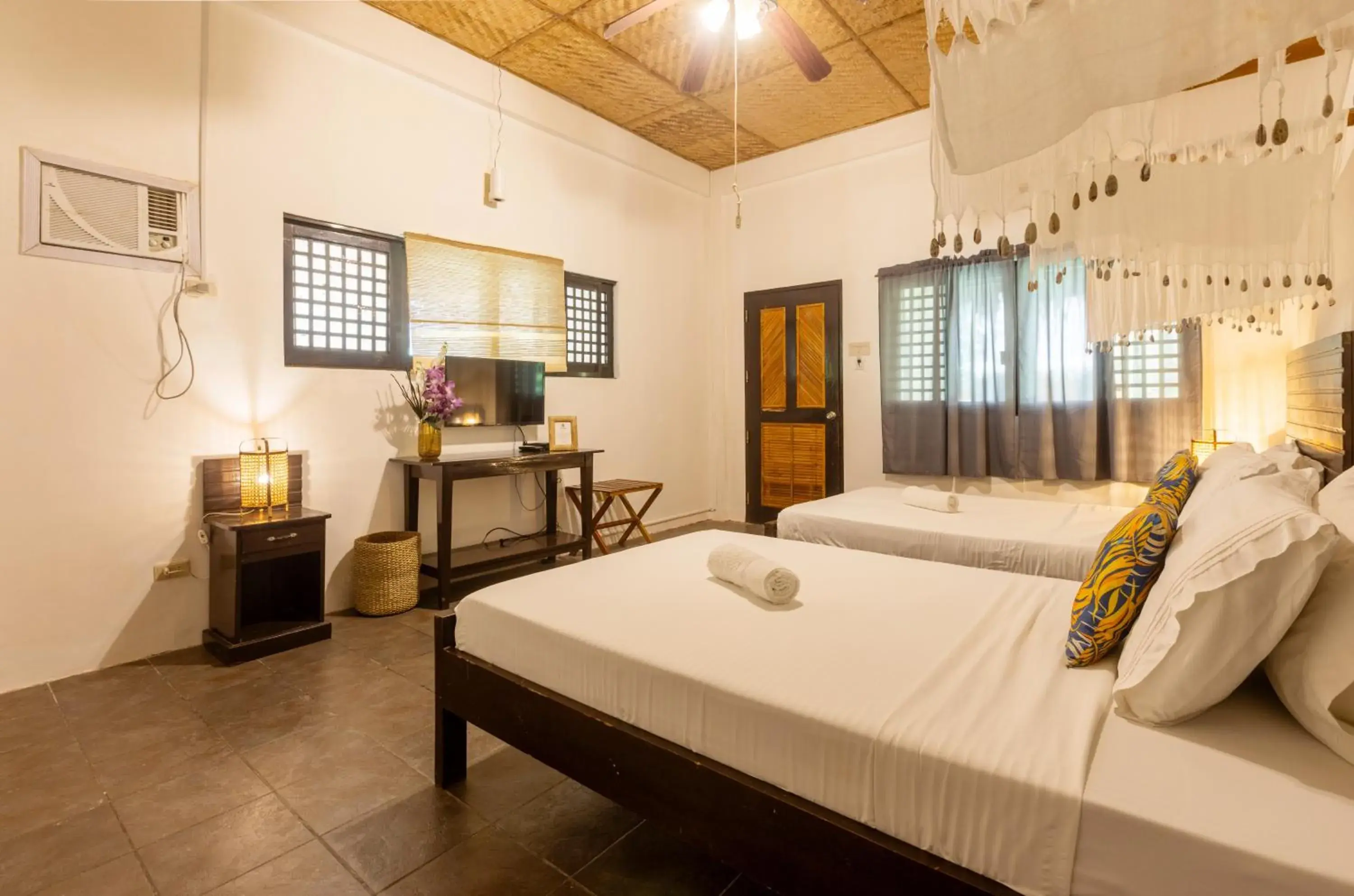 Bed in Nabulao Beach Resort Bed in Nabulao Beach Resort