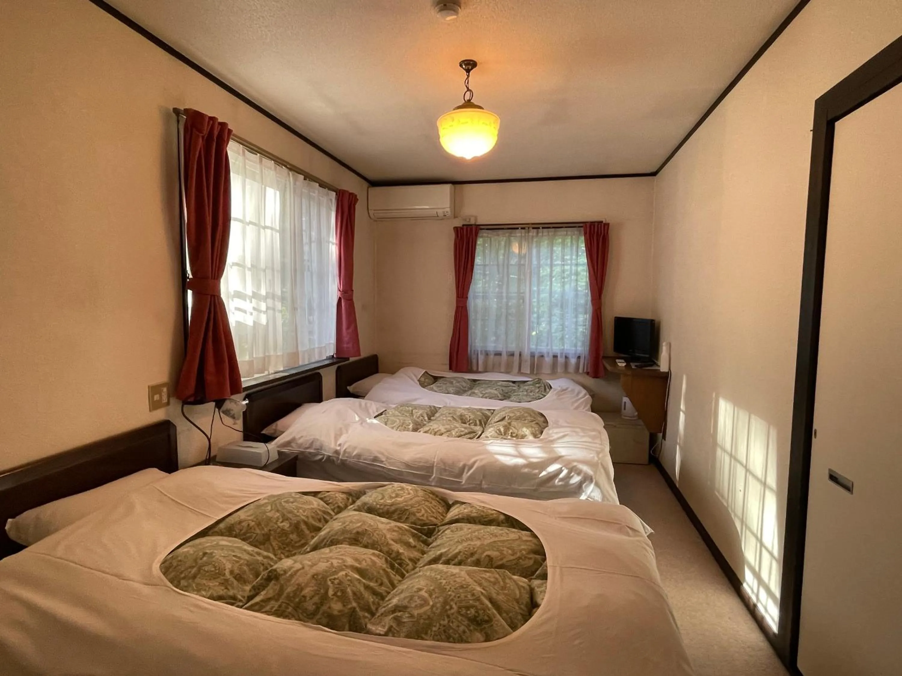 Bed in Hotel Sejour Mint in Hakuba