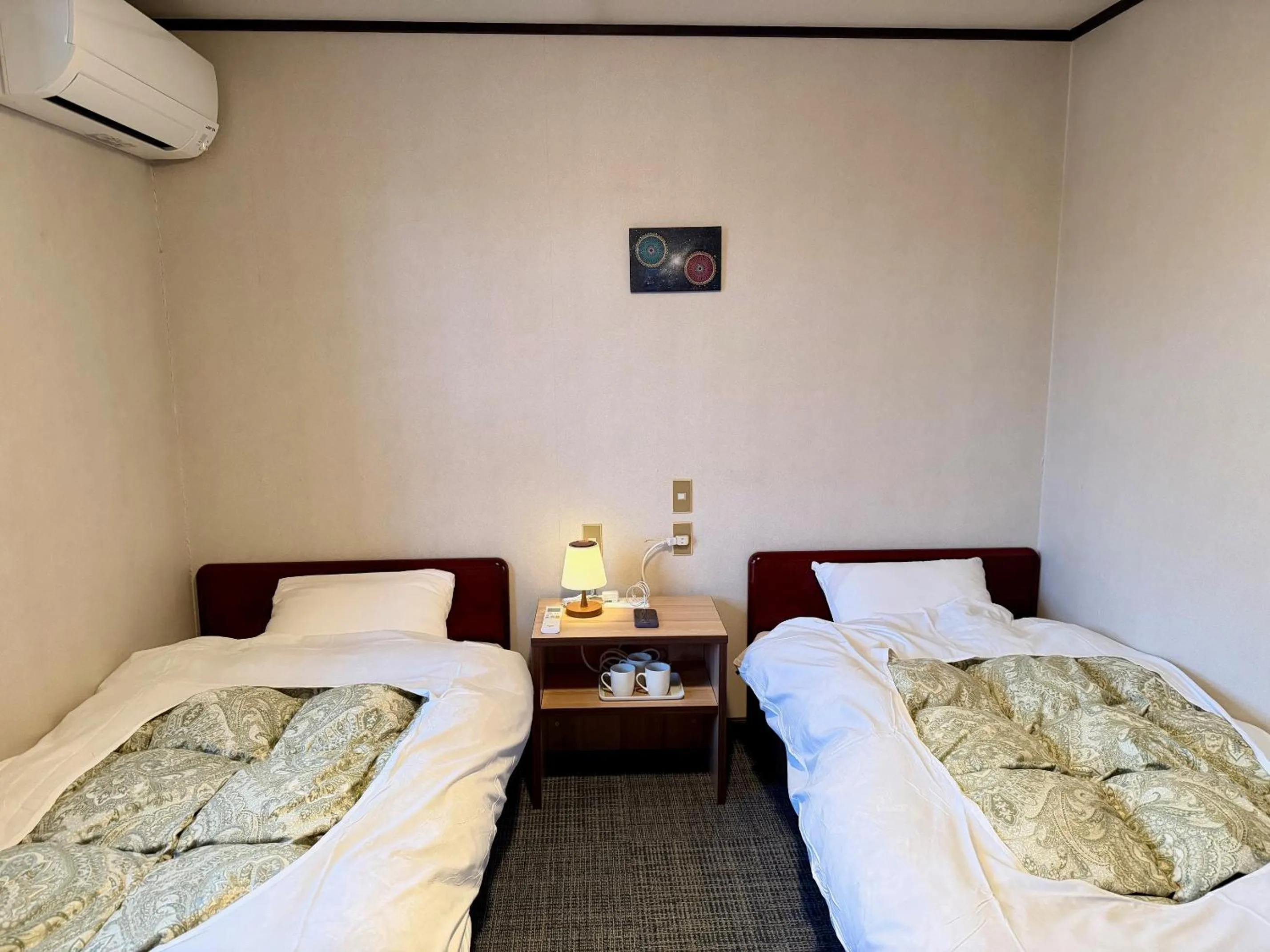 Bedroom, Bed in Hotel Sejour Mint in Hakuba