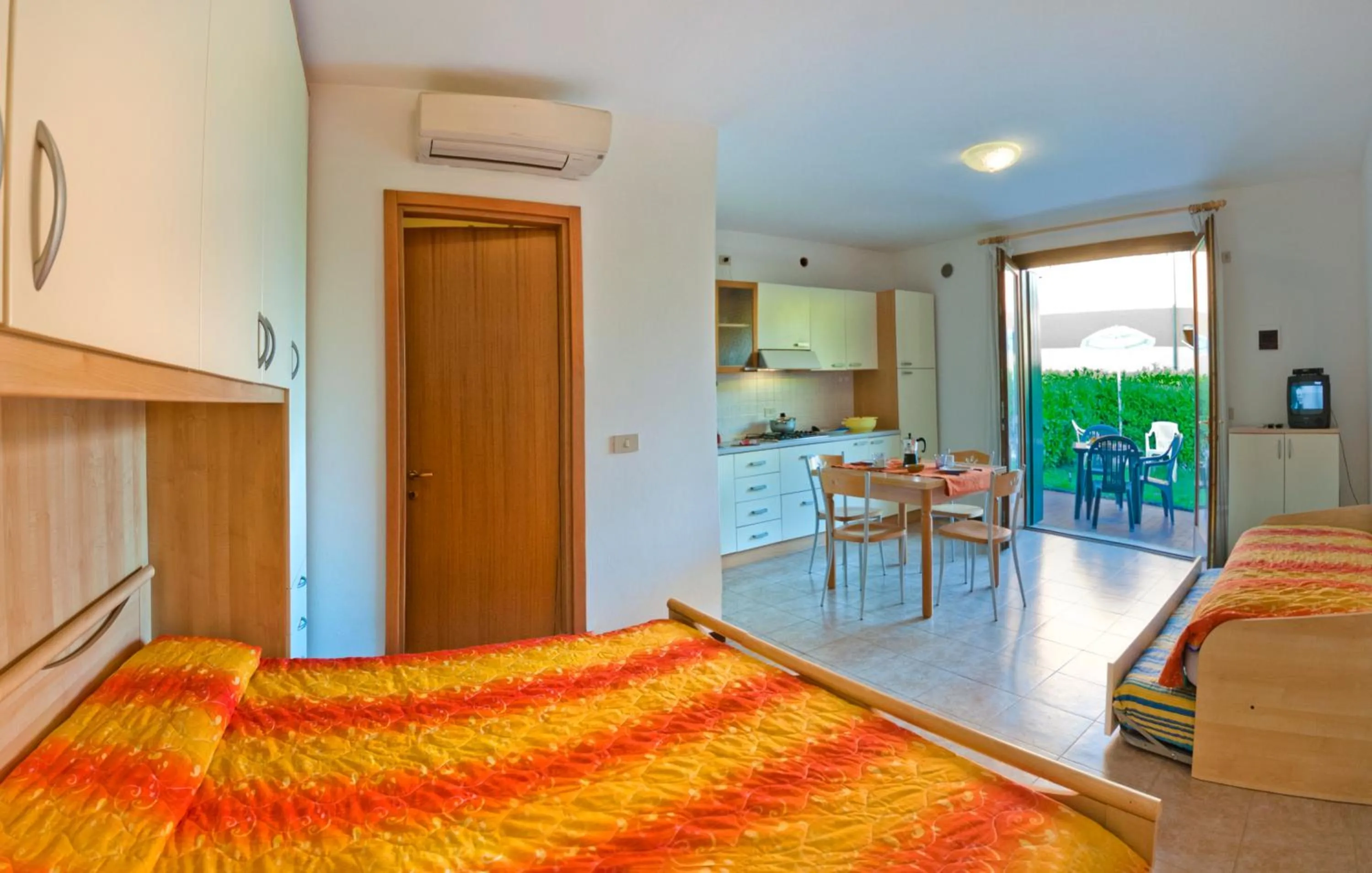 Photo of the whole room, Bed in Villaggio Cristina