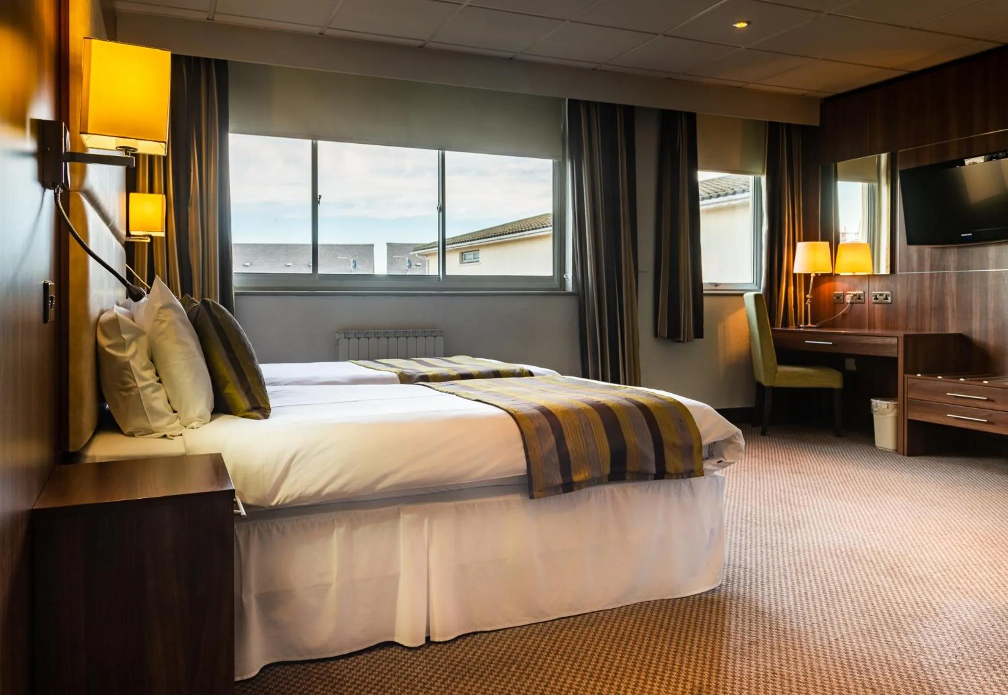 Bed in Hotel Ambassadeur