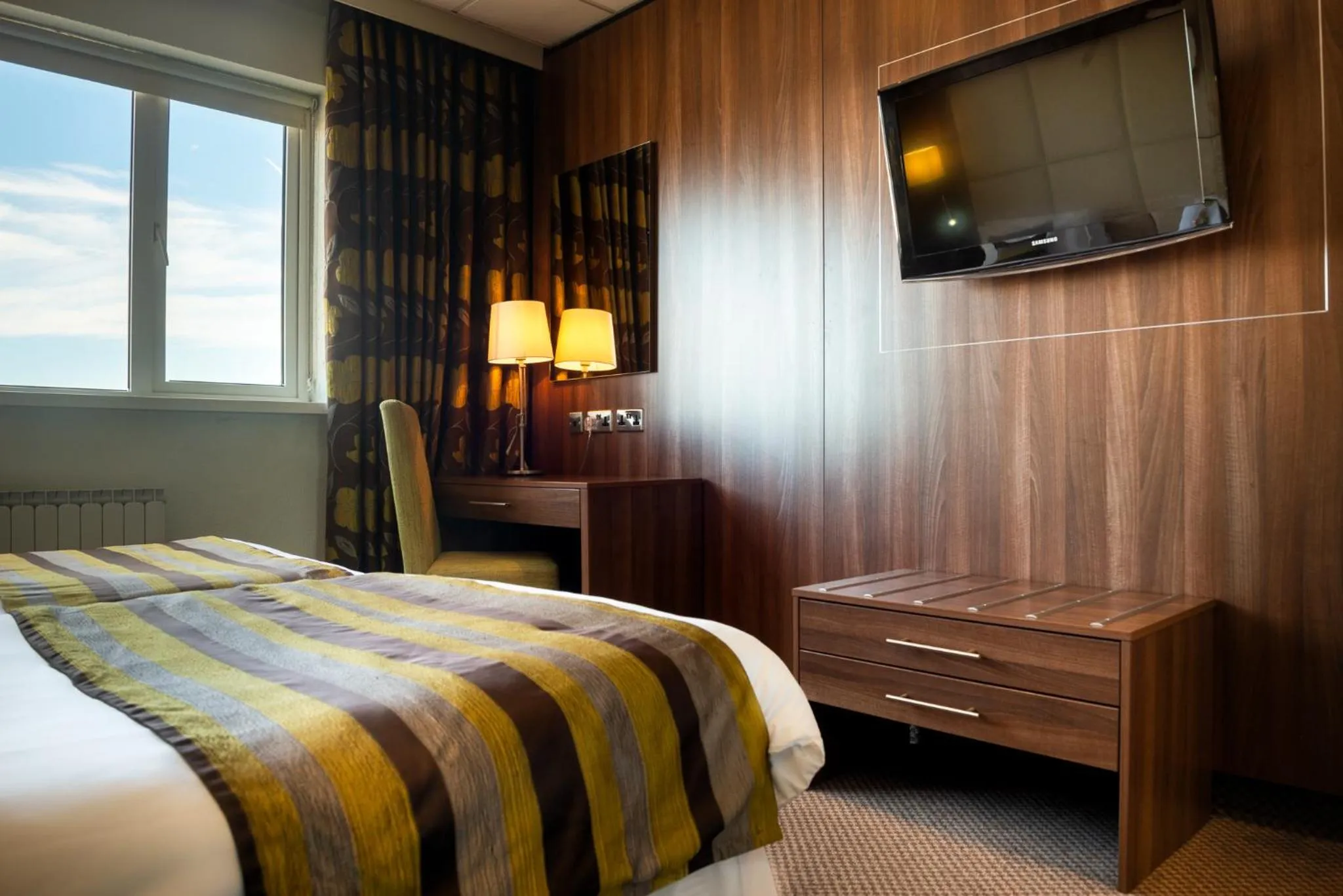 Bed in Hotel Ambassadeur