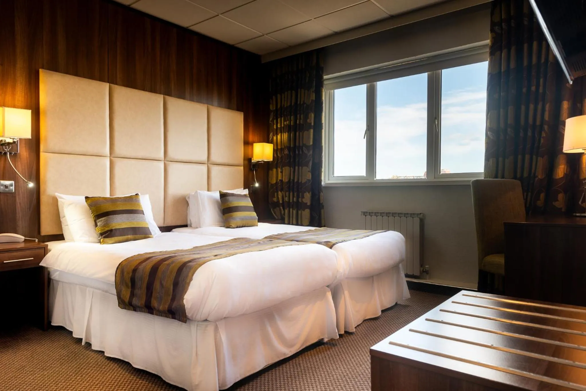 Bed in Hotel Ambassadeur