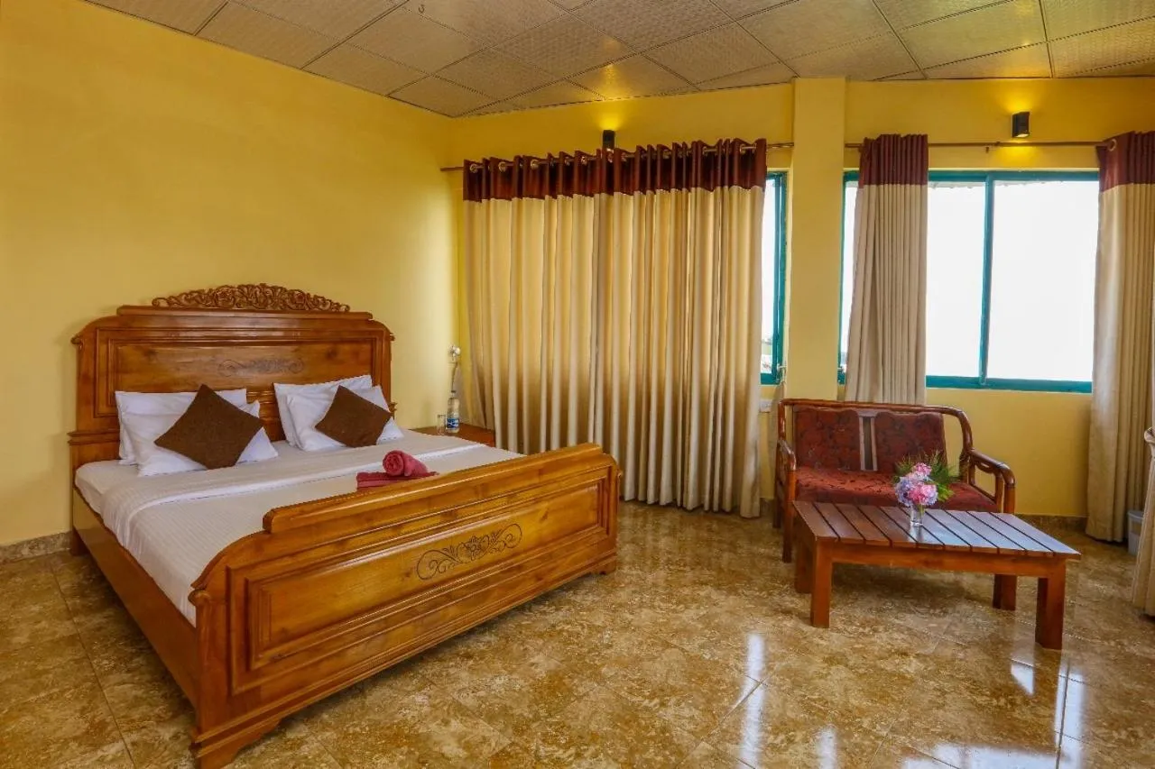 Bed in Srilak View Holiday Inn