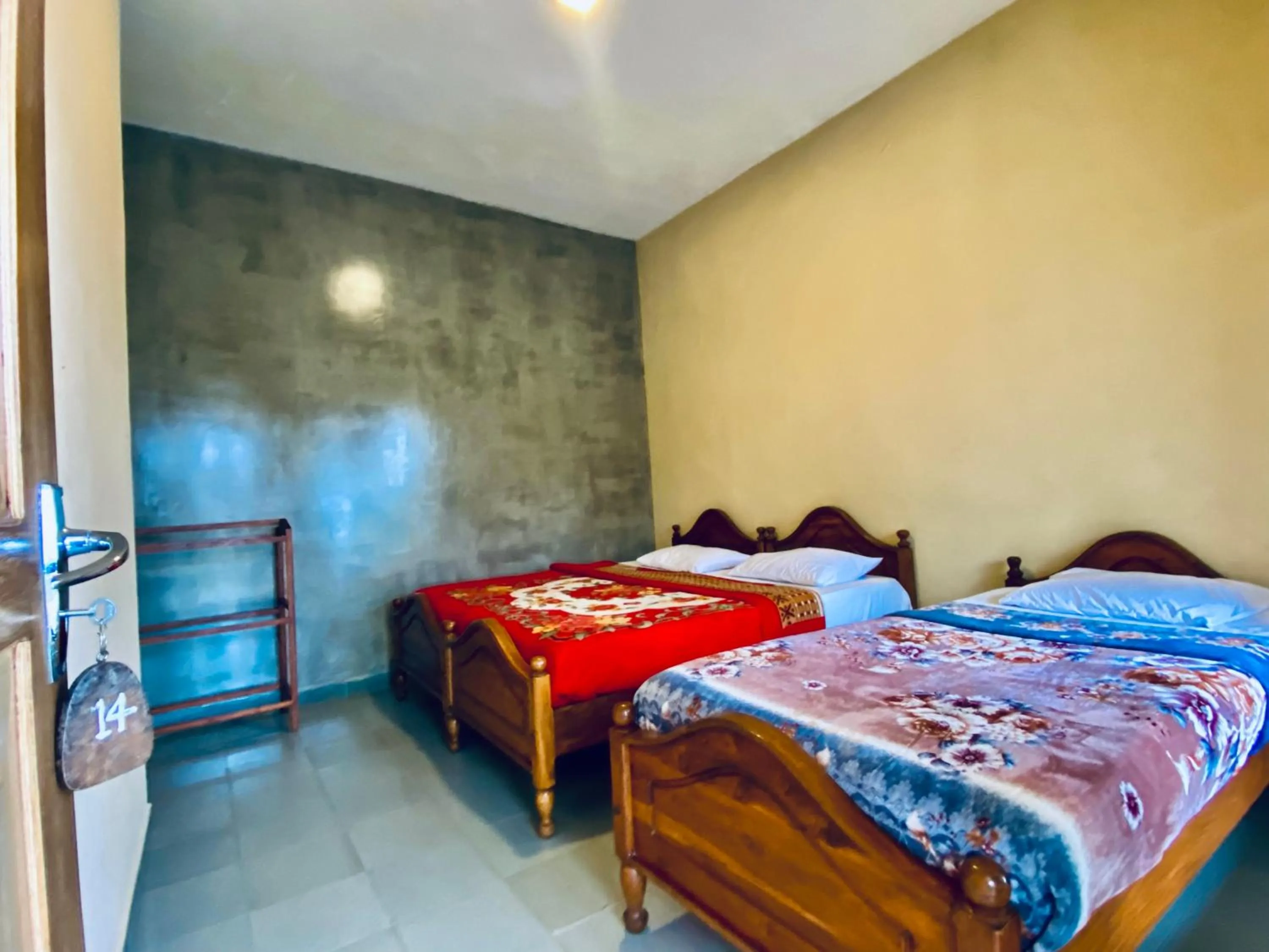 Bed in Srilak View Holiday Inn