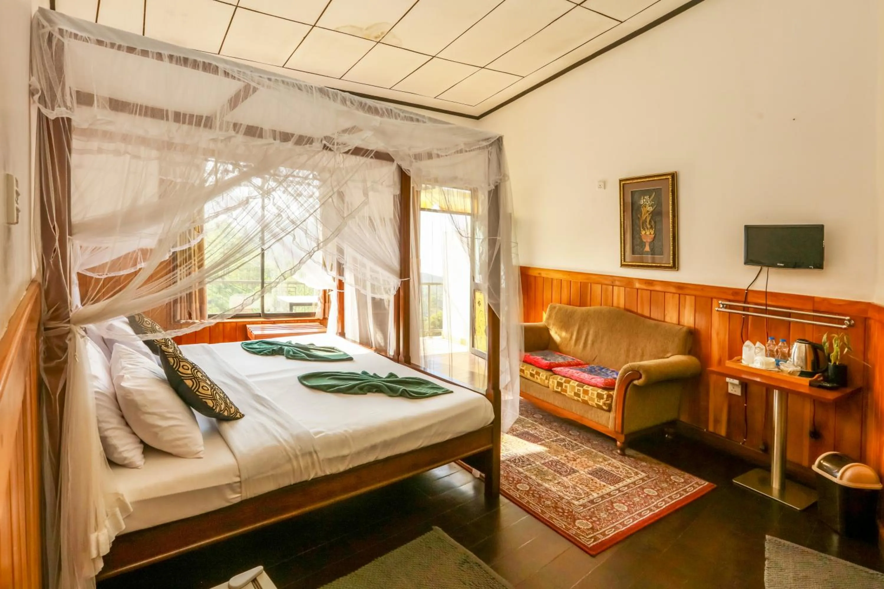 Bed in Srilak View Holiday Inn