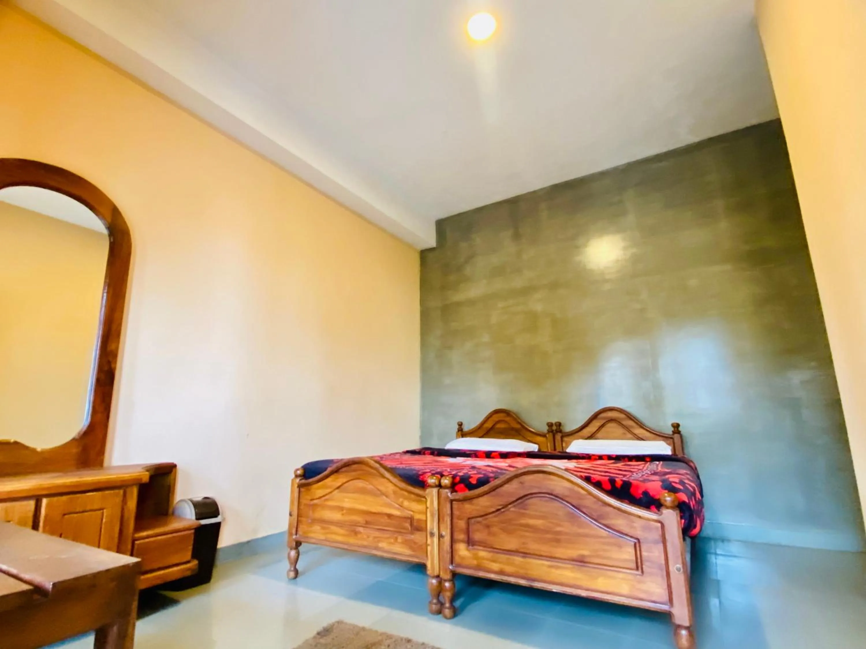 Bed in Srilak View Holiday Inn