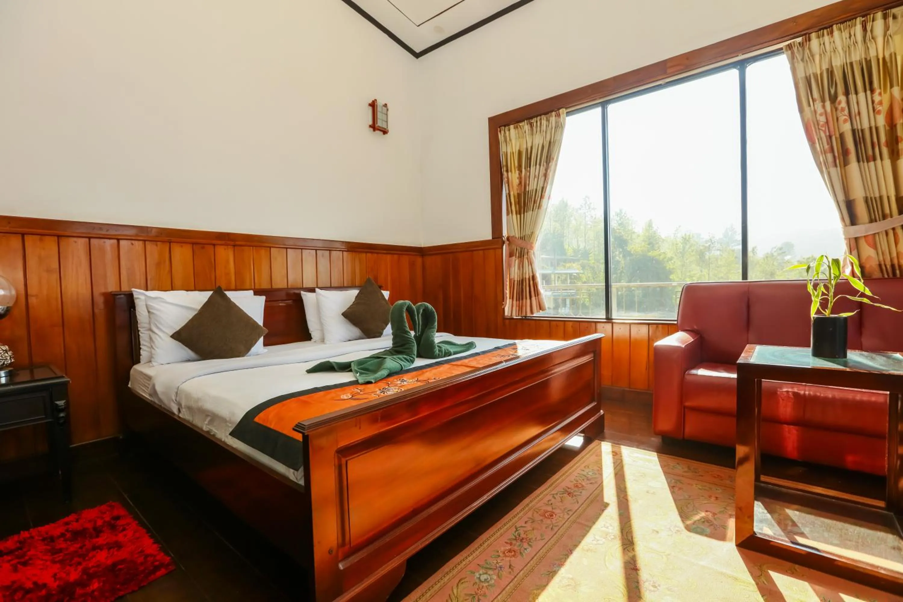 Bed in Srilak View Holiday Inn