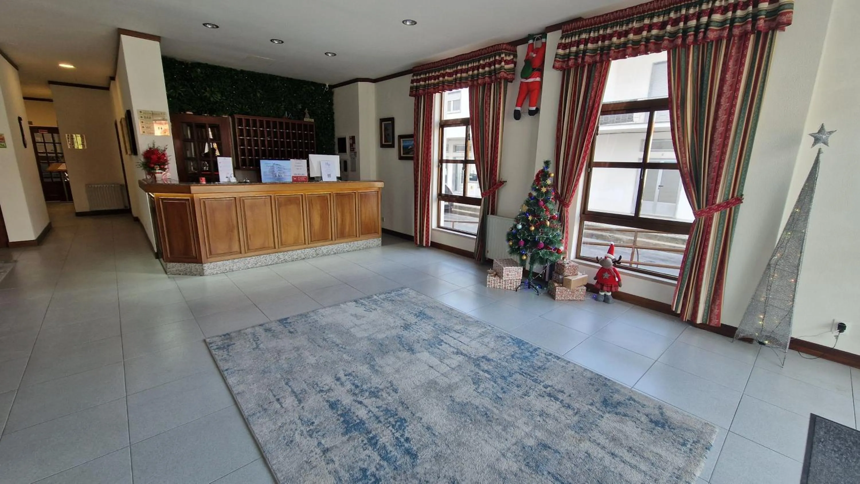 Lobby or reception in Hotel Peninsular