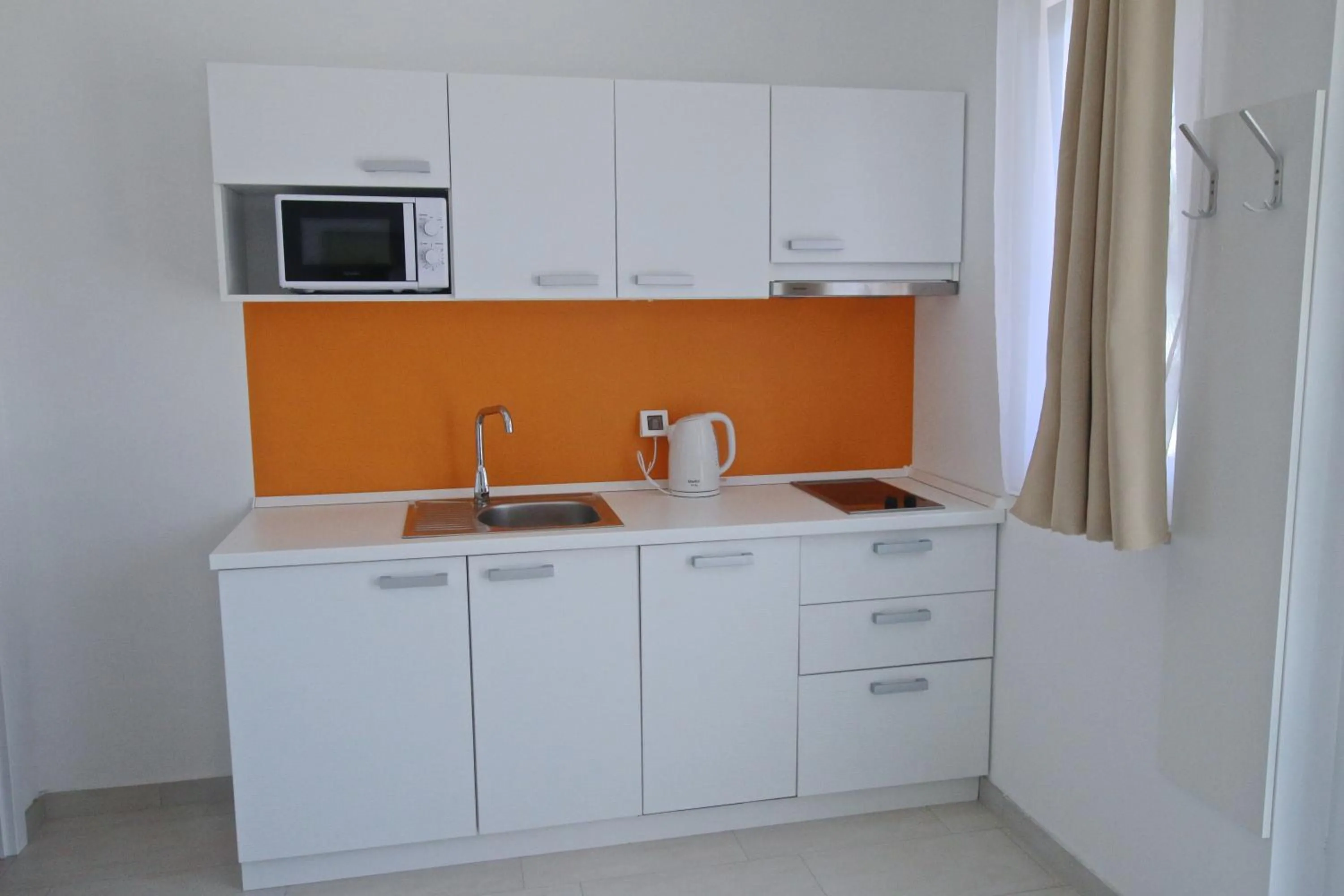 Kitchen or kitchenette in Solaria Apartments Porec