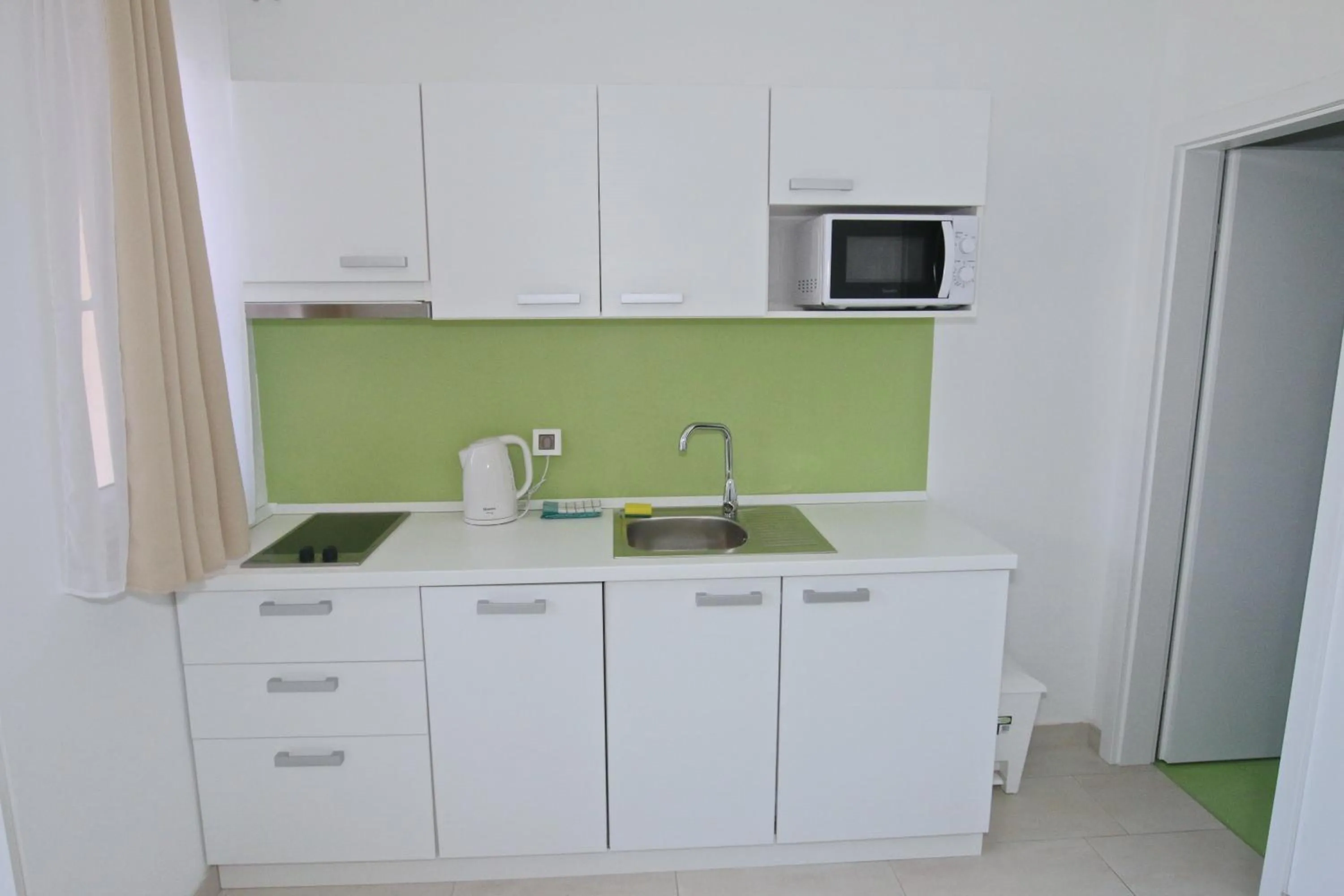 Kitchen or kitchenette in Solaria Apartments Porec